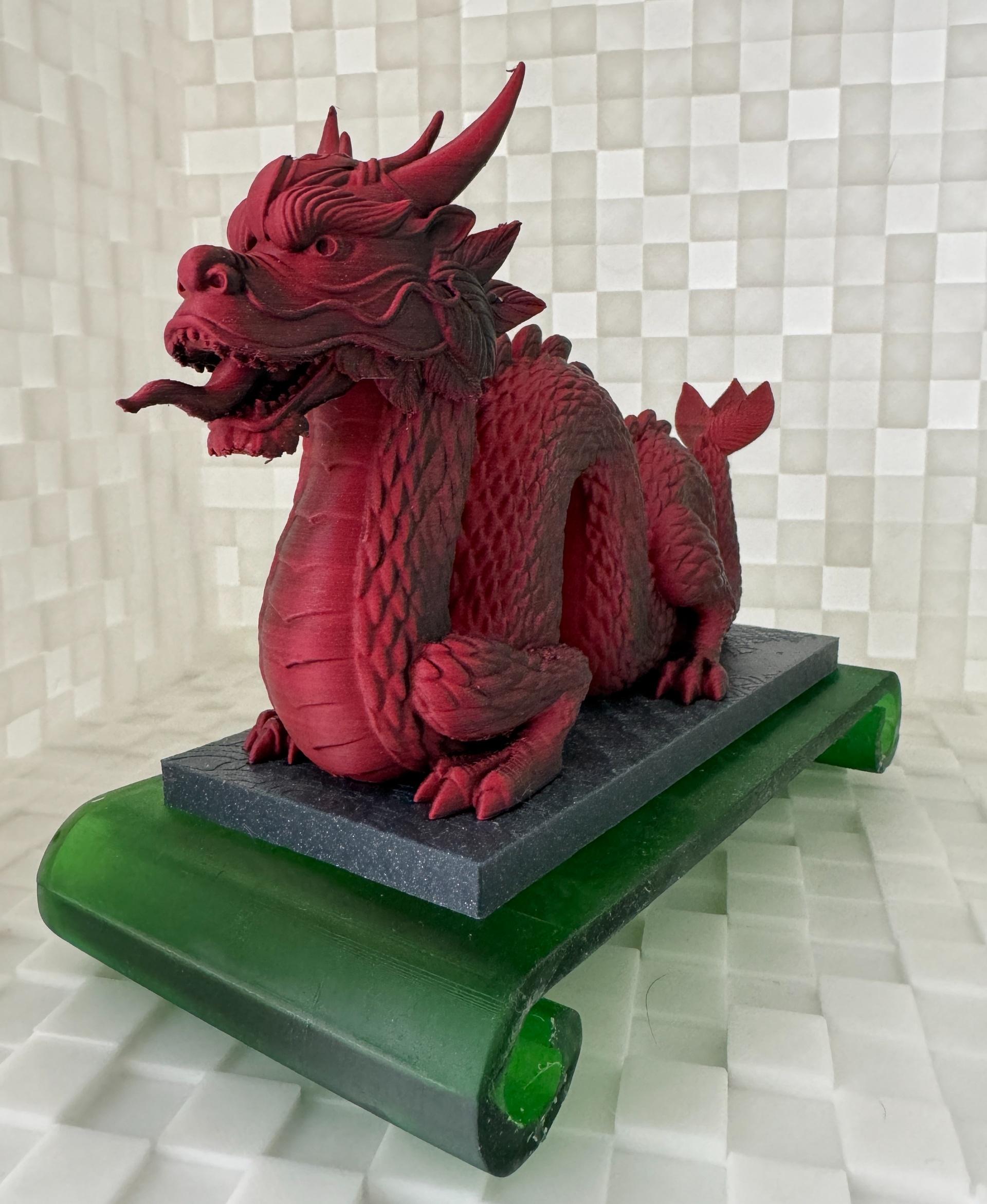 Chinese Dragon  - Printed in Polymaker Polyterra Shadow Red PLA, Overture Sparkle Dark Grey PLA on the Bambu X1C at 0.2mm layer height, and the base is printed in Anycubic Translucent Green Resin on the Elegoo Saturn 2 to give it that look of Jade. - 3d model