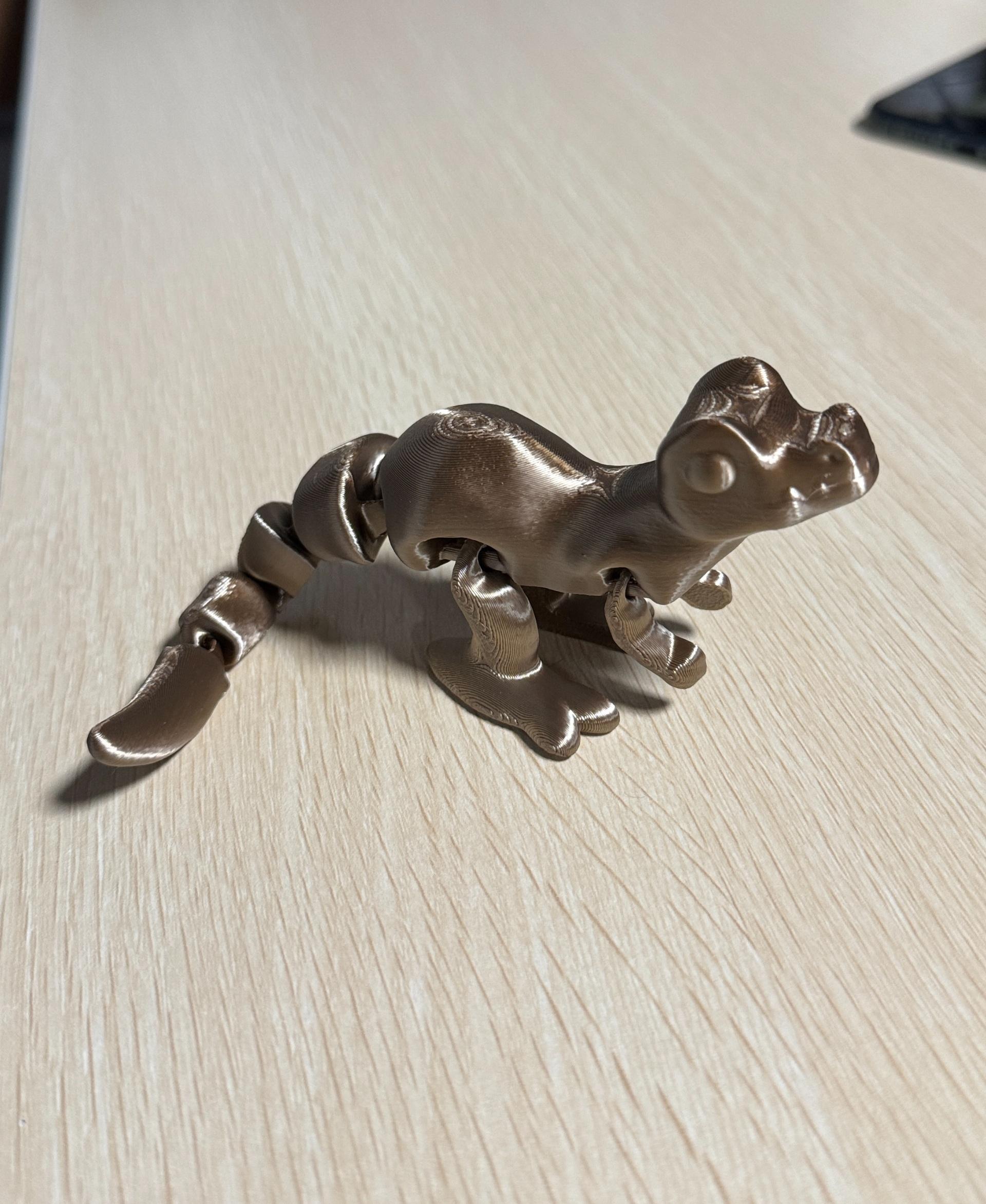 Cute Flexi Raptor - Printed on a Bambu P1S using TTYT3D `Silk Shiny Fast Color Gradient Change` PLA
- no supports - 3d model