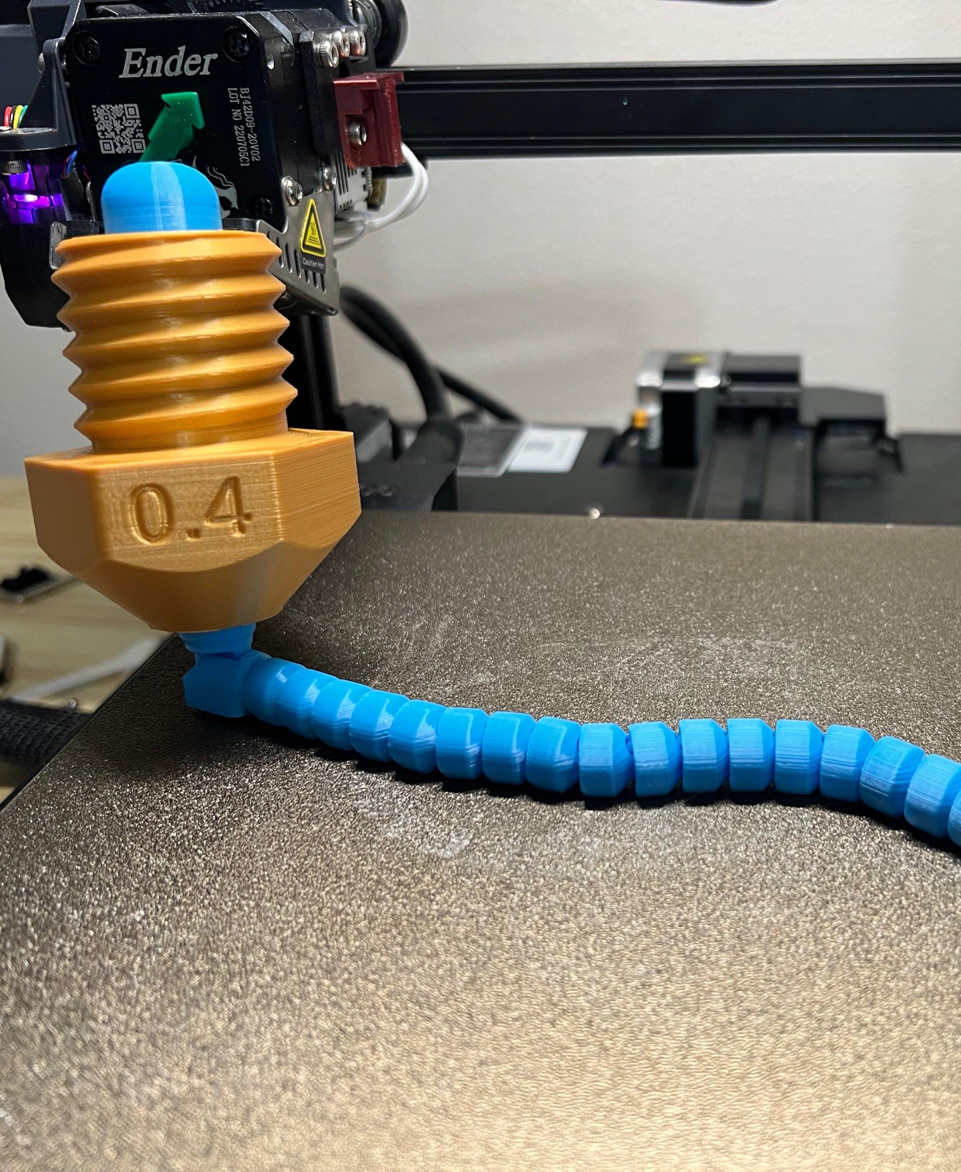 Flexi Extruder Toy - Printed beautifully on an Ender3 S1 using a Sonic Pad. - 3d model