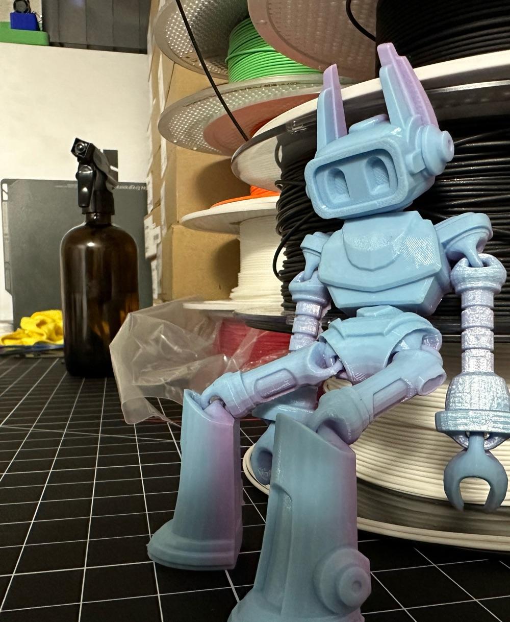 ZILLOLAAB - ZIPPY THE BOT 🤖 - Really cool print! Thanks for the hard work!

I struggled to get the hands to stick, went through about 3 prints with really slow print speeds and still managed to knock themthem loose! Eventually I added brims and it came out above!

Print was .16 layer height and Cookie cad unicorn pet g with a bambu x1c - 3d model