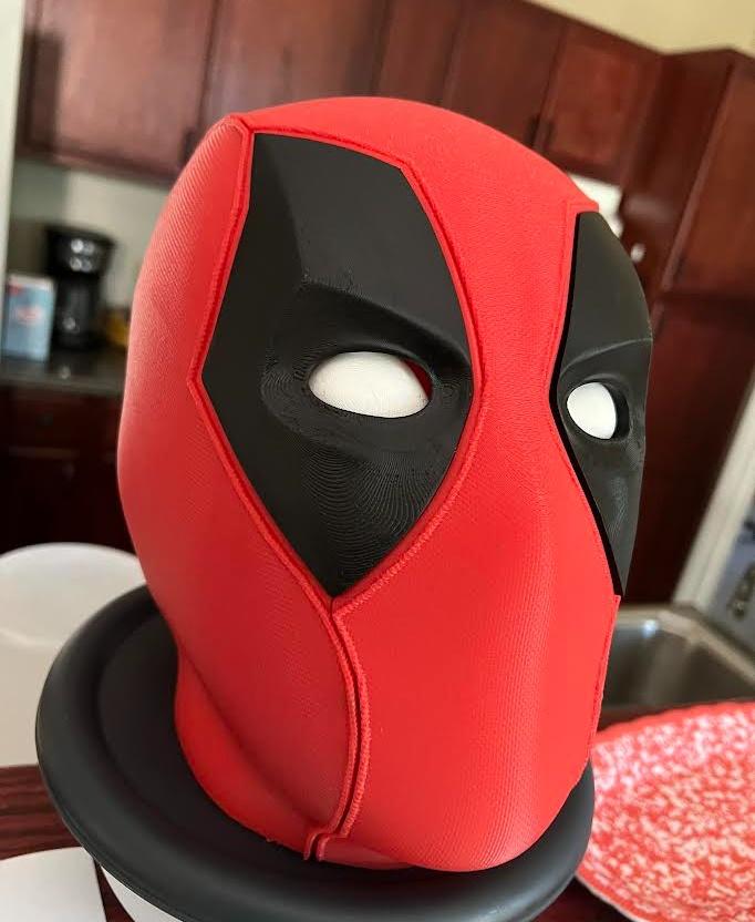 Deadpool Cowl - Turned out really nice. Some of the parts I had to improvise due to messing with it while it was printing. It fits together nicely, however, it sadly didn't fit my head due to having to scale it down to 99% so it would fit on the printing plate.  - 3d model