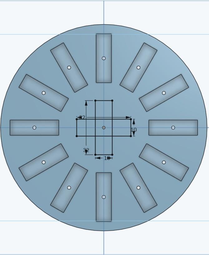 Générateur triphasé - Voici ci-joint la seconde esquisse de notre "Porte aimant"
Le but va être de venir créé le lien entre notre porte aimant et notre tige.
Nous créons une croix a l'aide de deux rectangle centré autour de l'origine de notre disque.
-Dimension de nos rectangles : 32mm/10mm
 - 3d model