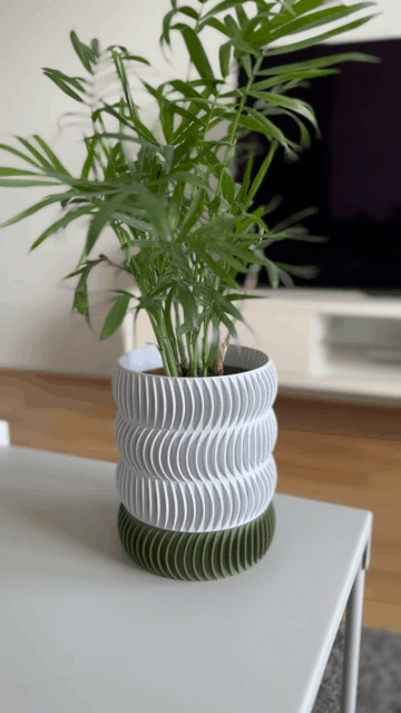 Swirly planter with a drip tray 3d model