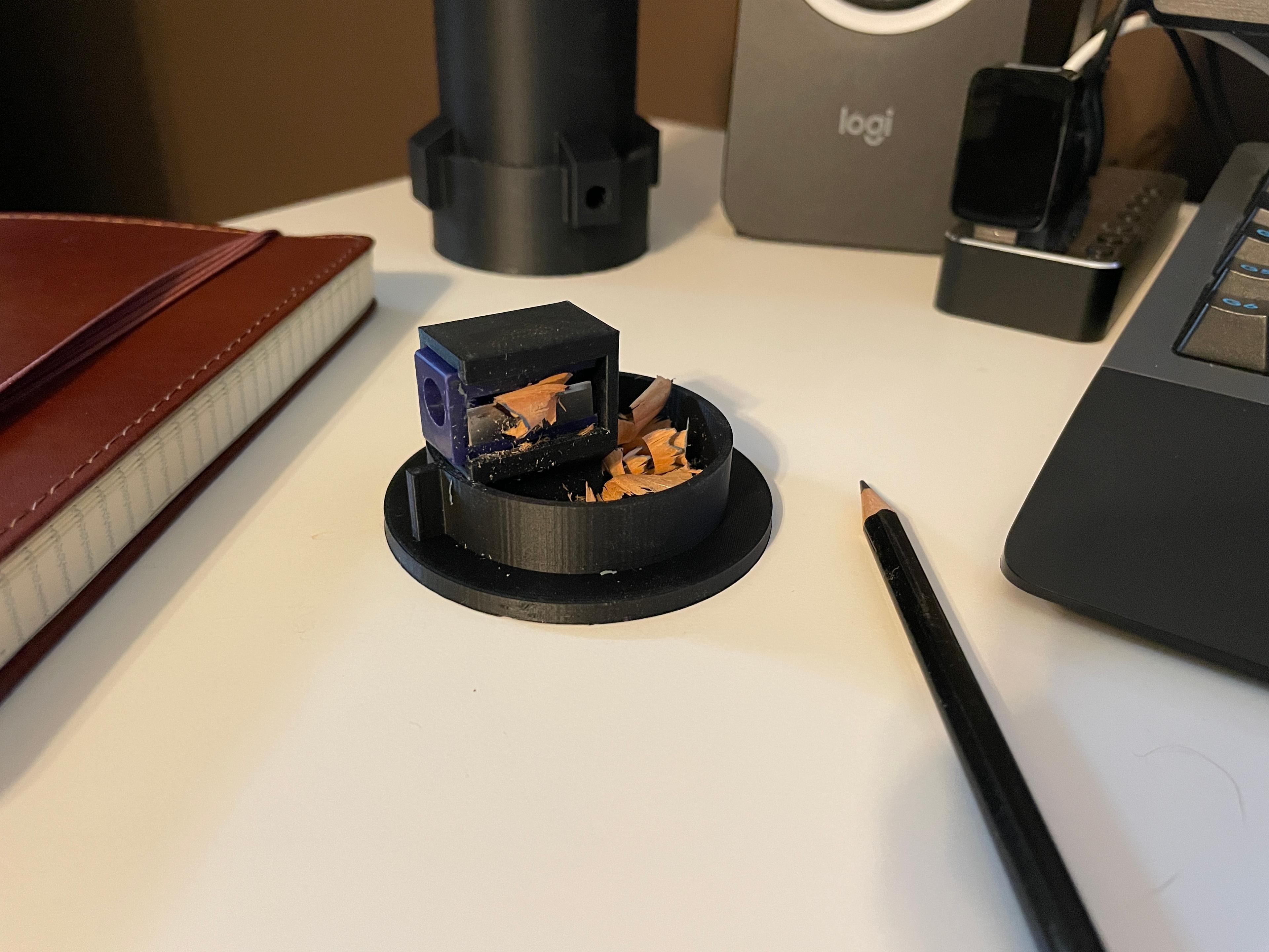 Block Lightsaber Desk Organizer - Printed in matte black PLA on a desk showing the added pencil sharpener feature - 3d model