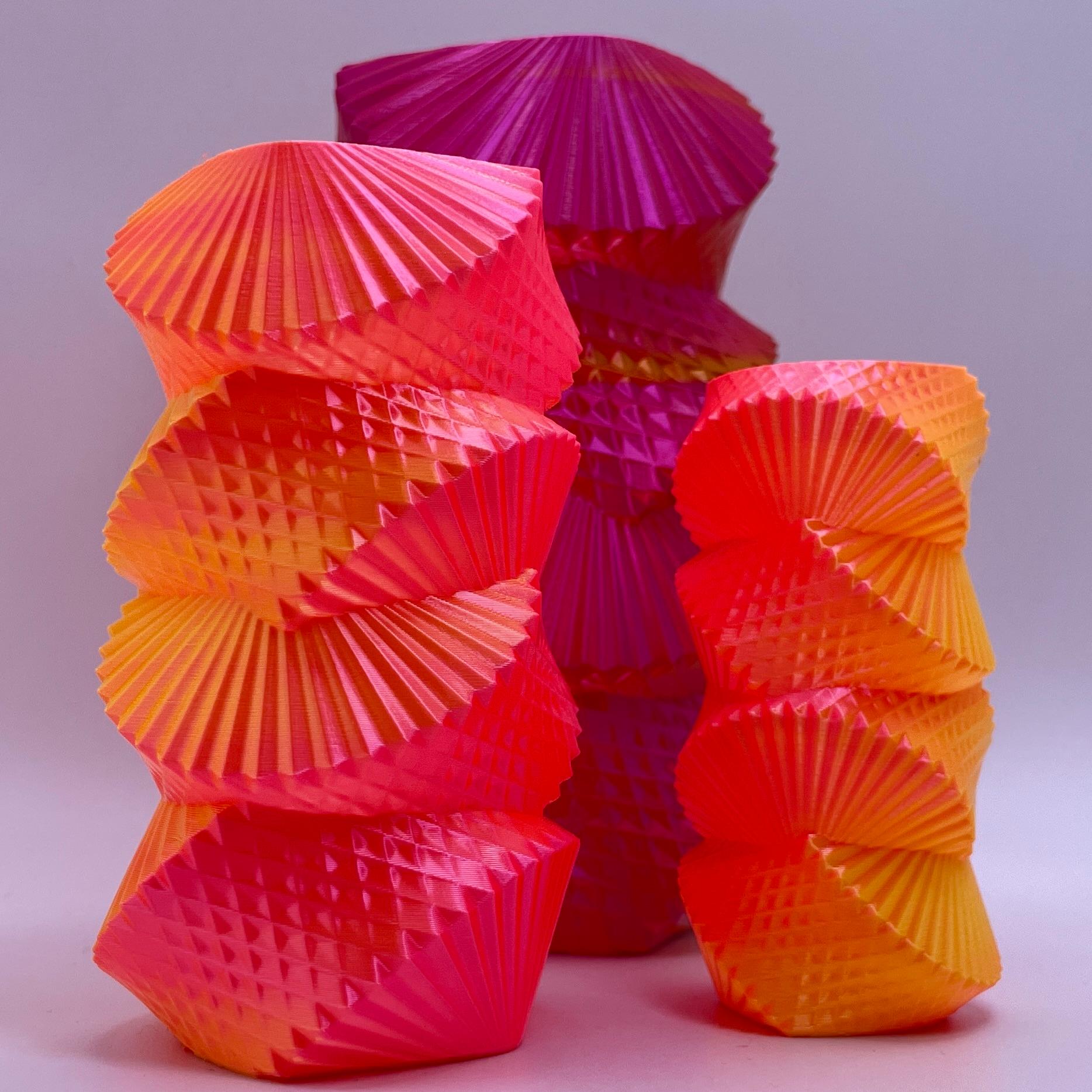 Groovy Vase - Love this model!  I had to use my favourite Sparta3D Gold-Rose and Yellow-Pink Prismatic filaments for these! Printed live on MakerDeck! - 3d model