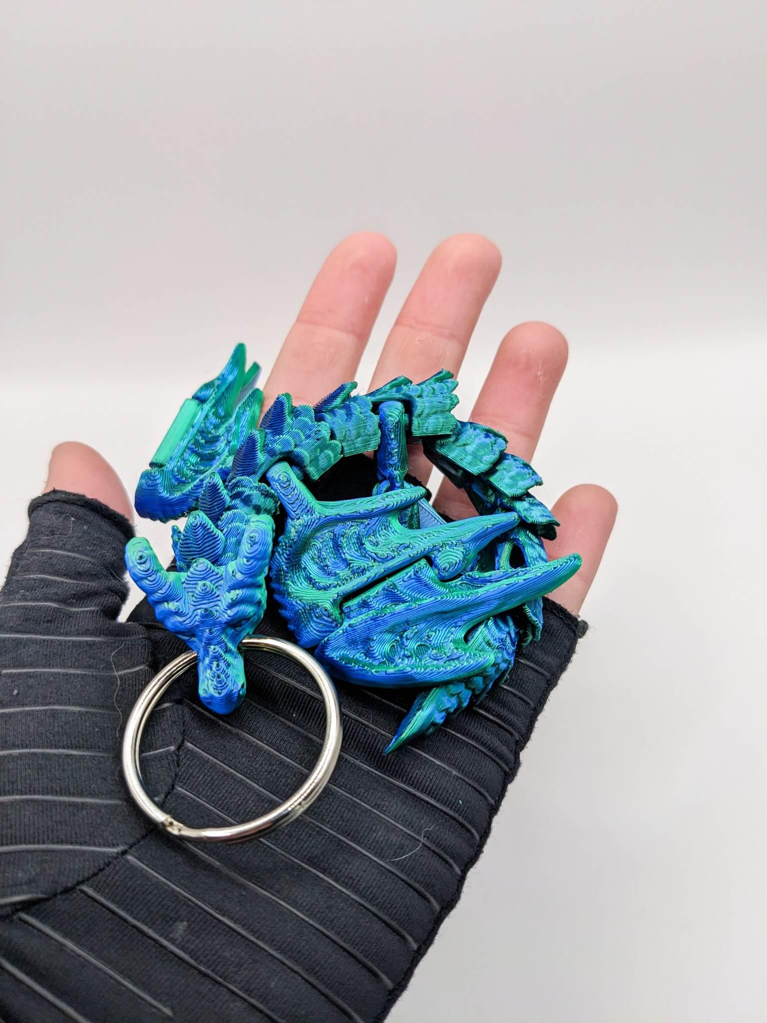 Baby Flexi Ram Horn Dragon Keychain 3d model