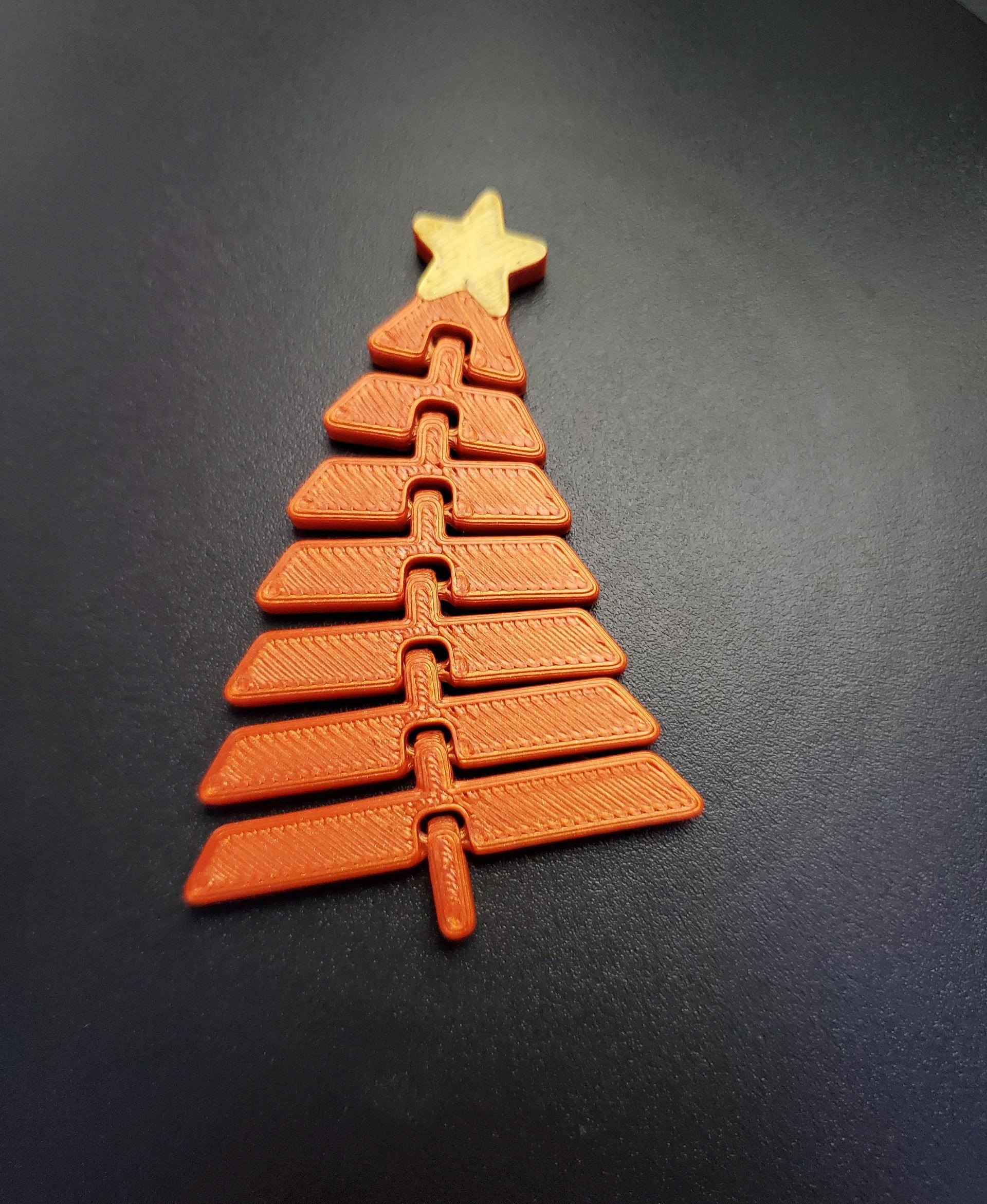 Articulated Christmas Tree with Star - Print in place fidget toy - 3mf - justmaker metallic orange - 3d model