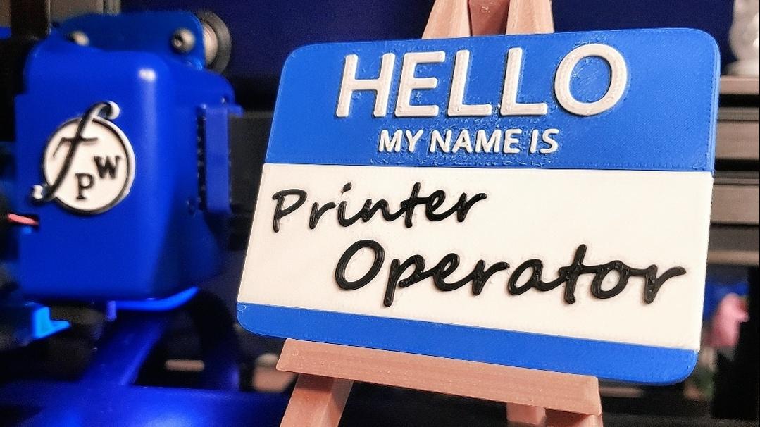 "Printer Operator" -Nametag/Wall Hang (MMU 3mf) - 'HELLO MY NAME IS Printer Operator' Nametag printed in Sapphire Blue + B & W PolyTerra PLA. - 3d model