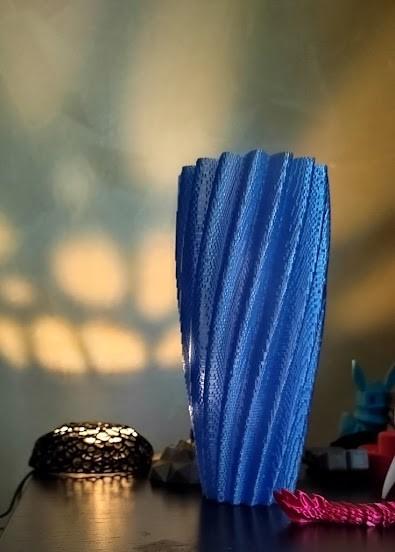 Multifaceted Vase - Printed with Noulei transparent light blue filament on a Prusa i3 MK3s in spiral mode. Print time 9 hours and 12 minutes. - 3d model