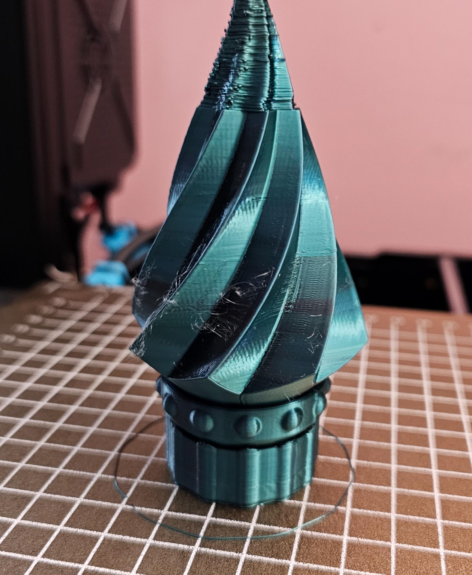 Planetary Tree - Mini - It was printing really well until the tree portion started wobbling at around 90% complete.
3 of the 4 outer gears moved freely, took a bit of persuasion to get the last one working.
Figured I'd post the make anyway.
Might try again and use glue stick to ensure it stays firmly anchored to the PEI sheet while printing.  - 3d model