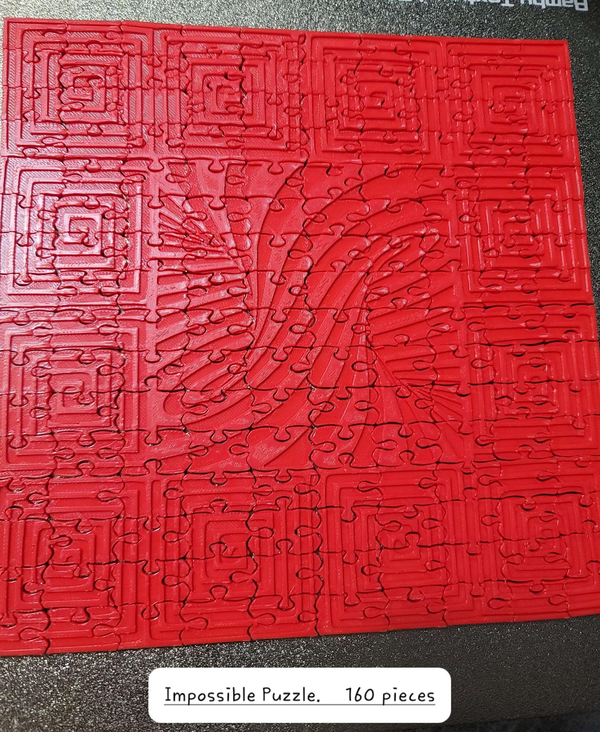Impossible Jigsaw Puzzle  - Make in Bambu basic PLA red on the P1S. I'm excited to gift this to my father who LOVES jigsaw puzzles. I specifically kept this one color to make it "impossible." - 3d model