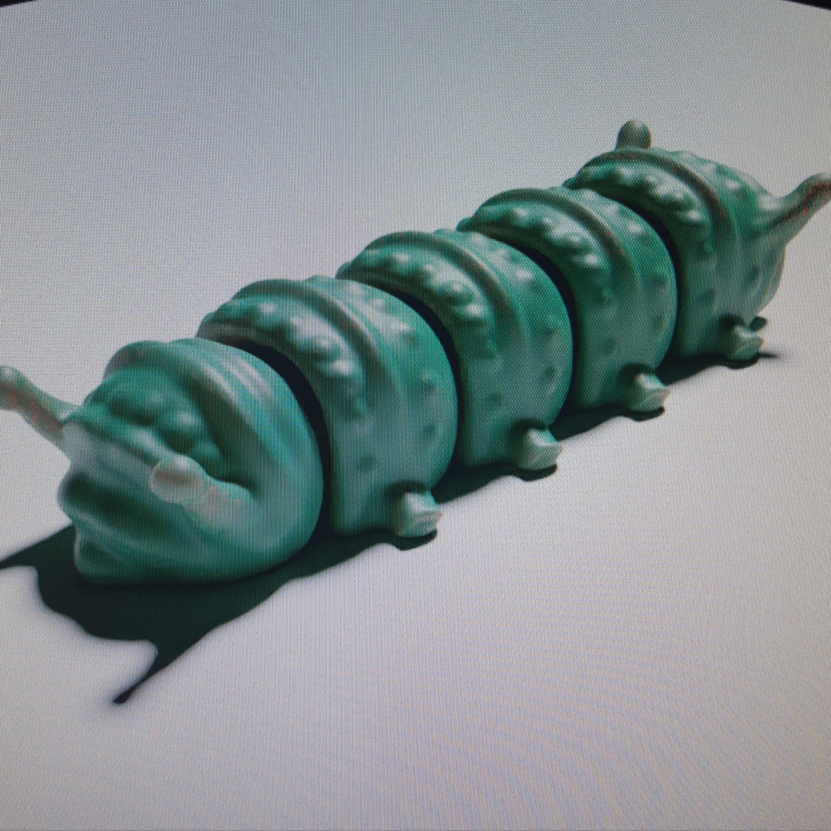 FLEXI CATERPILLAR IN COCOON CONTAINER KEYCHAIN - PRINT IN PLACE - SUPPORT FREE 3d model