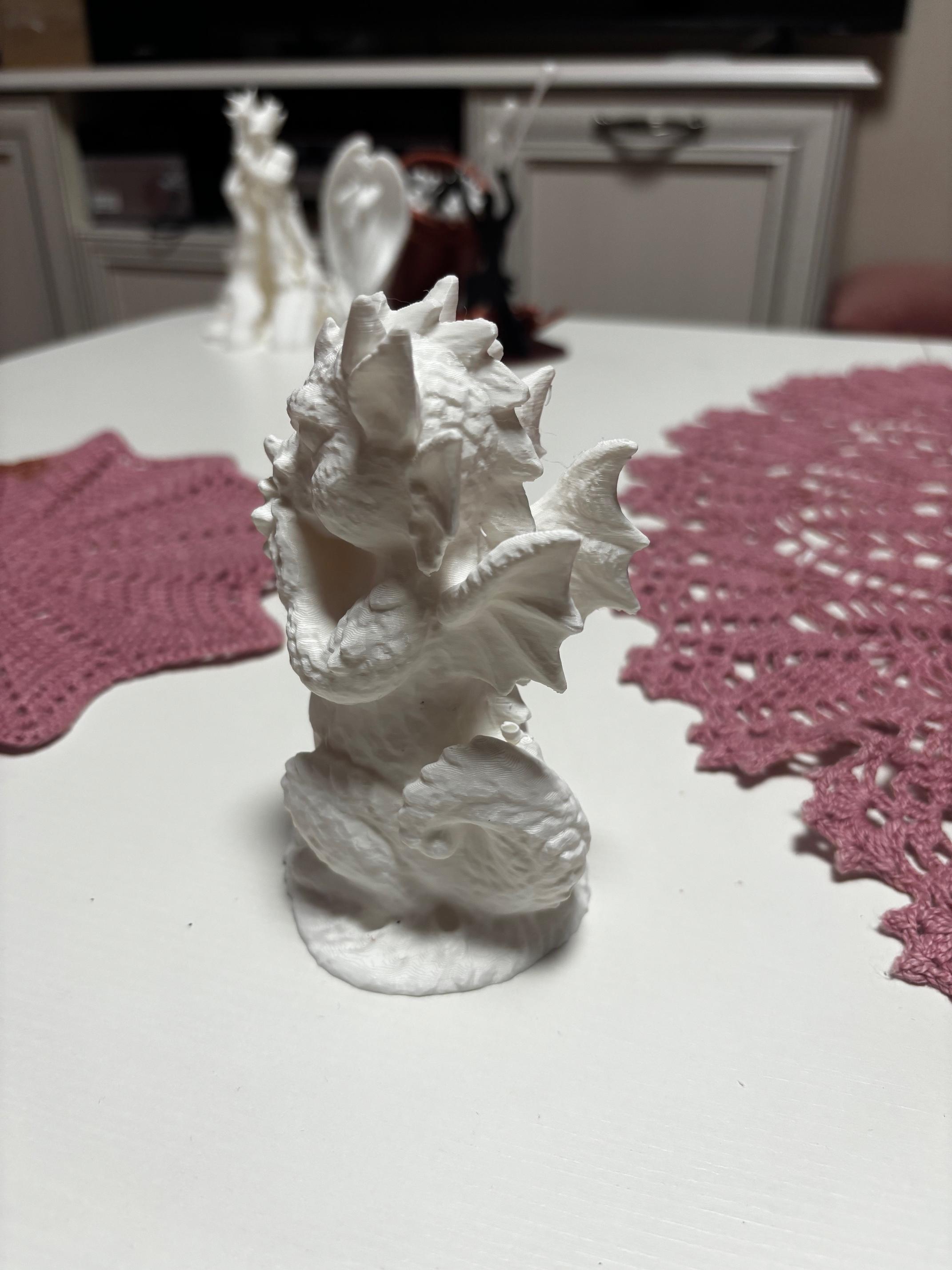 Sculpture of a baby dragon 3d model