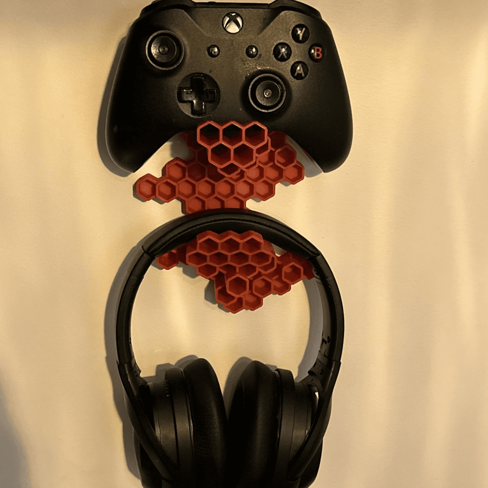Hex style gaming controller and headphone wall-mount holder 3d model