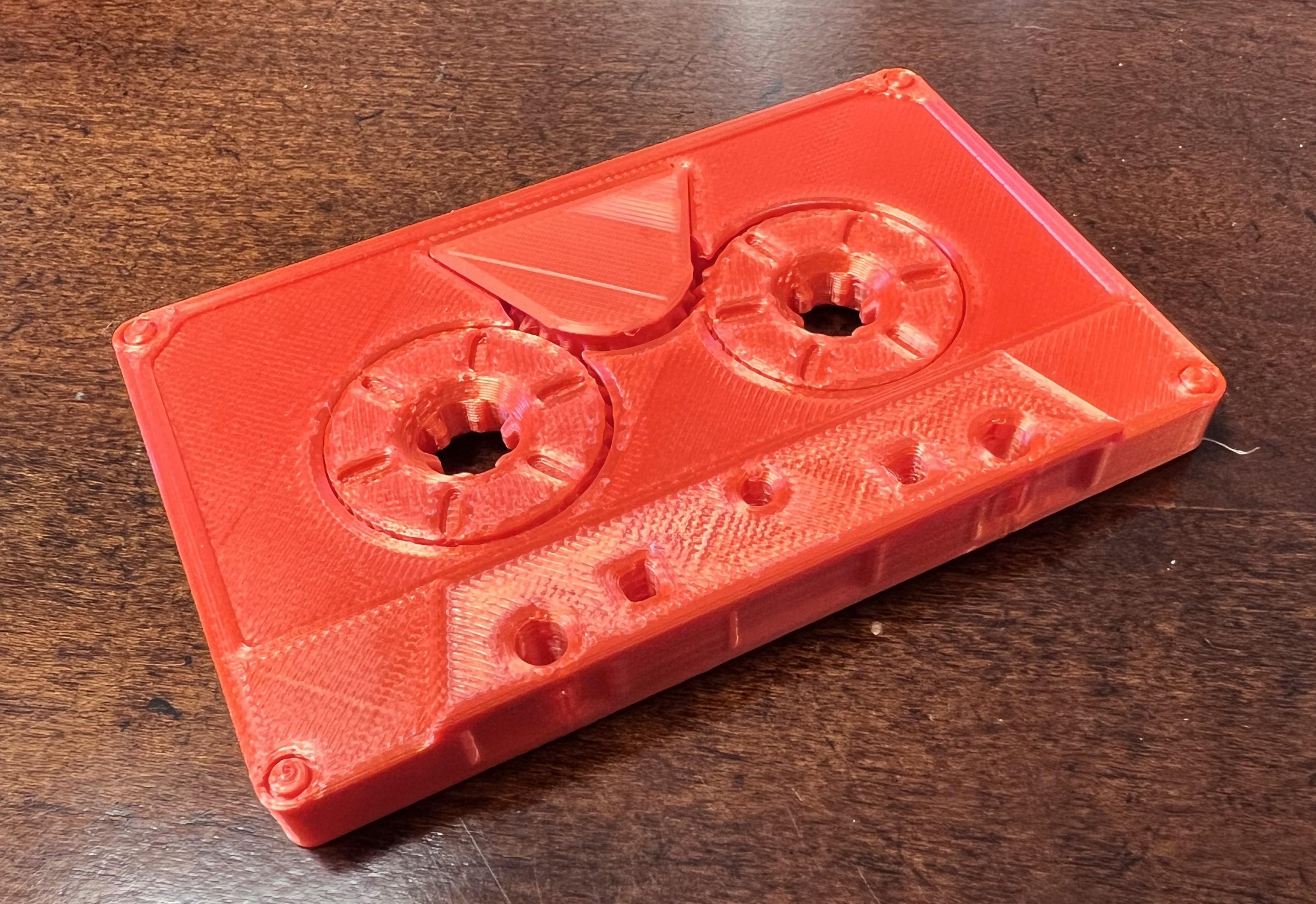 Cassette Tape  - Printed nicely! Inland Orange Silk. I glued the cover on, and put a little WD40 into the wheels which made it run very smoothly. - 3d model