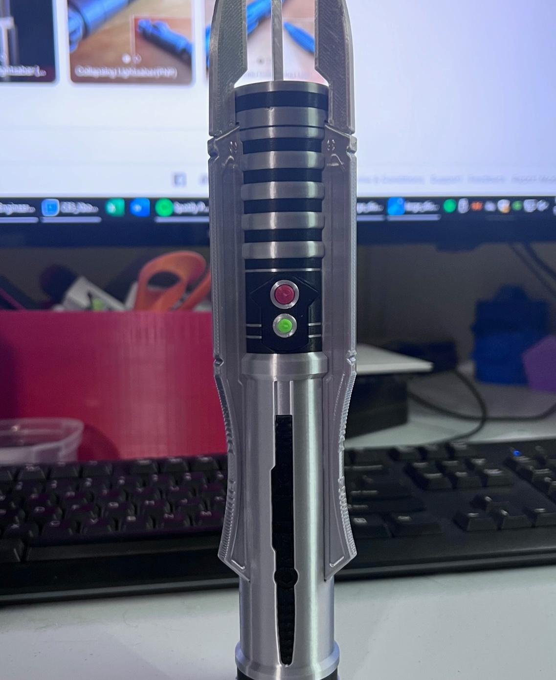 Revan’s Collapsing Lightsaber - Another winning design and very fun to print as always.  I love the extra detail and colors that can be gotten from doing these types of designs with just a single filament extruder.  Keep them coming and I'll keep on printing them. - 3d model