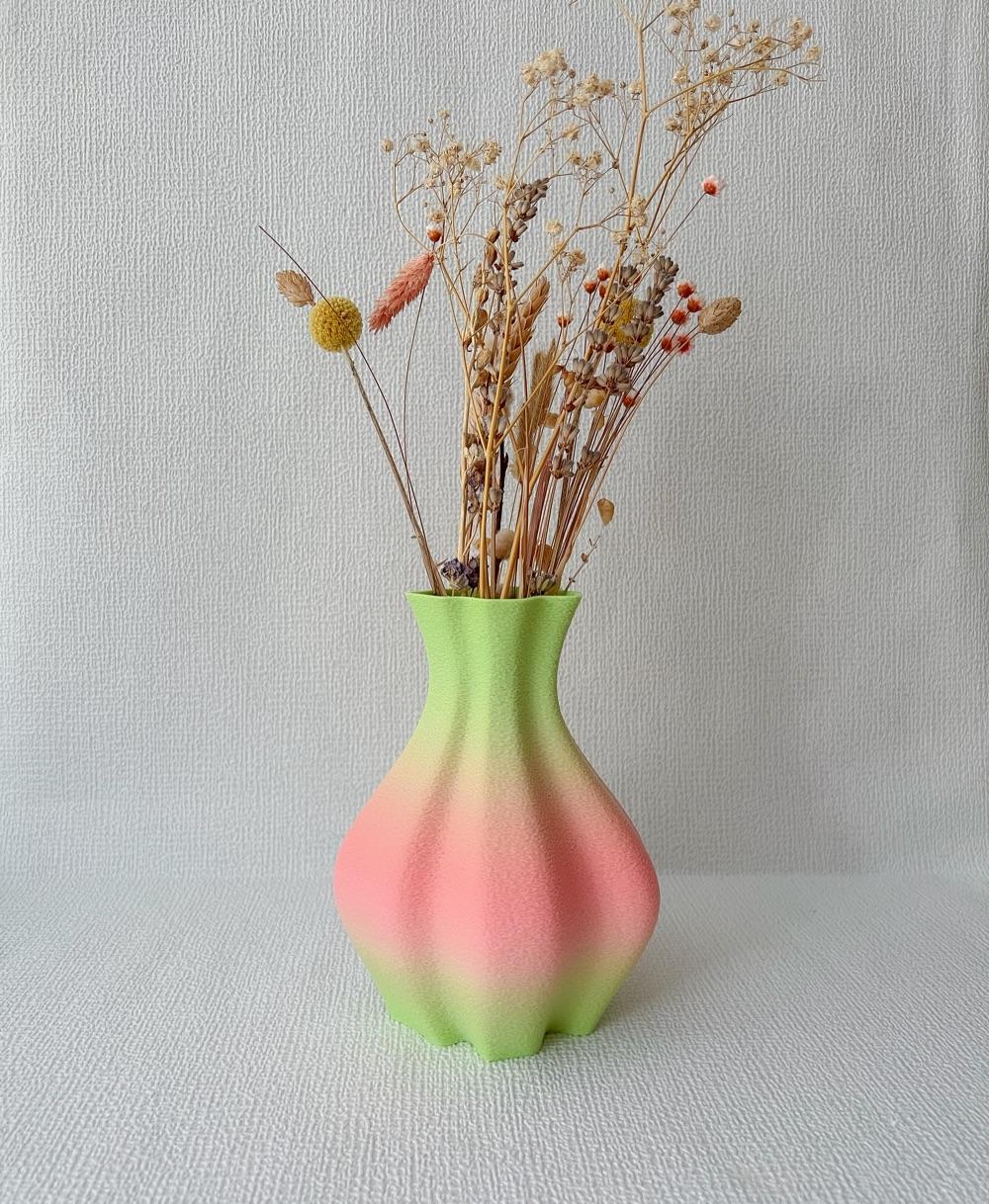Vase 2.3.2.stl - Beautiful vase in fuzzy skin.
Isanmate rainbow filament - 3d model