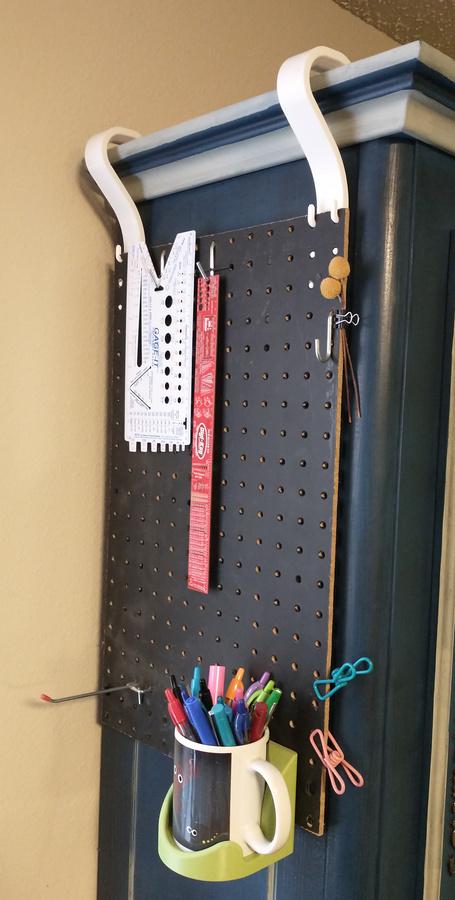 Pegboard hanger for cabinets with trim 3d model