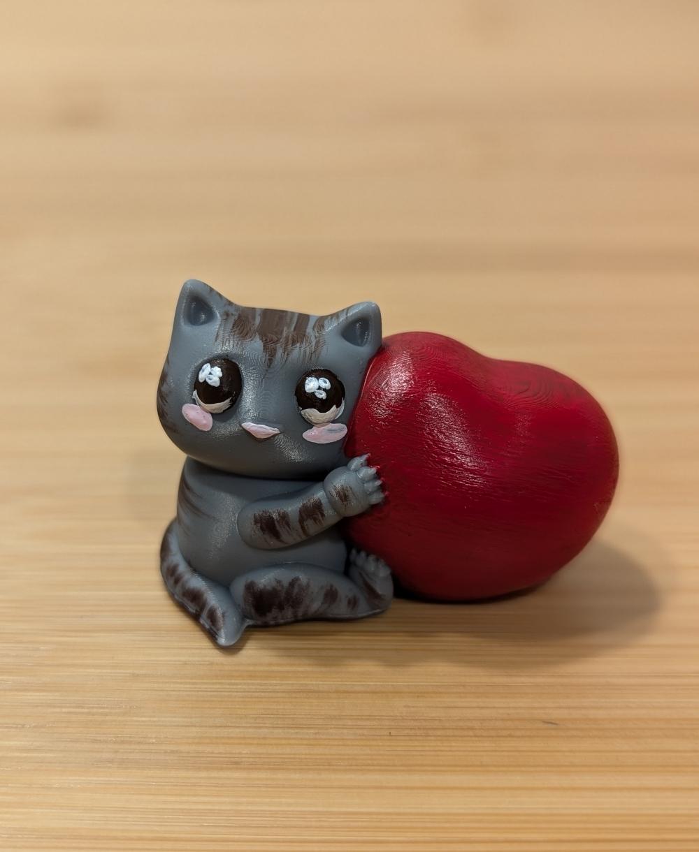 Cat Hugging a Heart 3d model