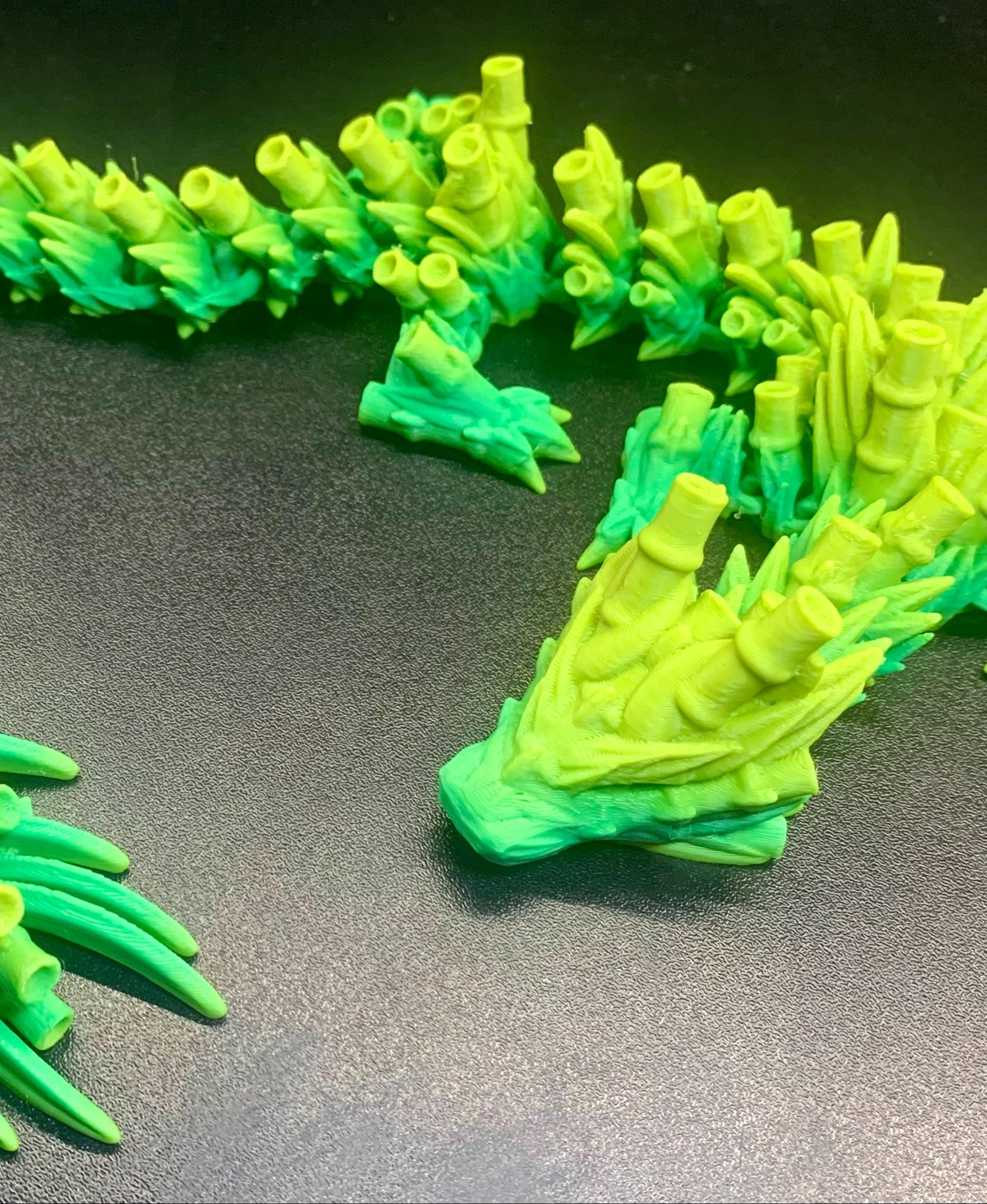Bamboo Dragon Cinderwing3D X BambuLab - Love this one so much!! 
The filament I used is the same iSANMATE PLA used in the designer's pics - 3d model