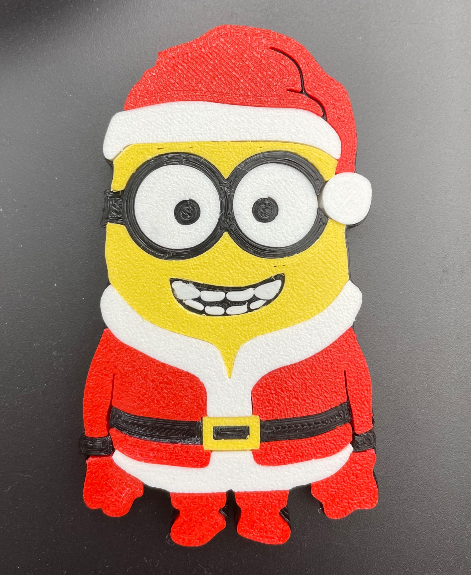 CHRISTMAS MINION - The Christmas Minion model printed great! I scaled this model down to 75% in my slicer and is still fit together quite nicely. I definitely recommend printing out this awesome model for the Holiday season! - 3d model
