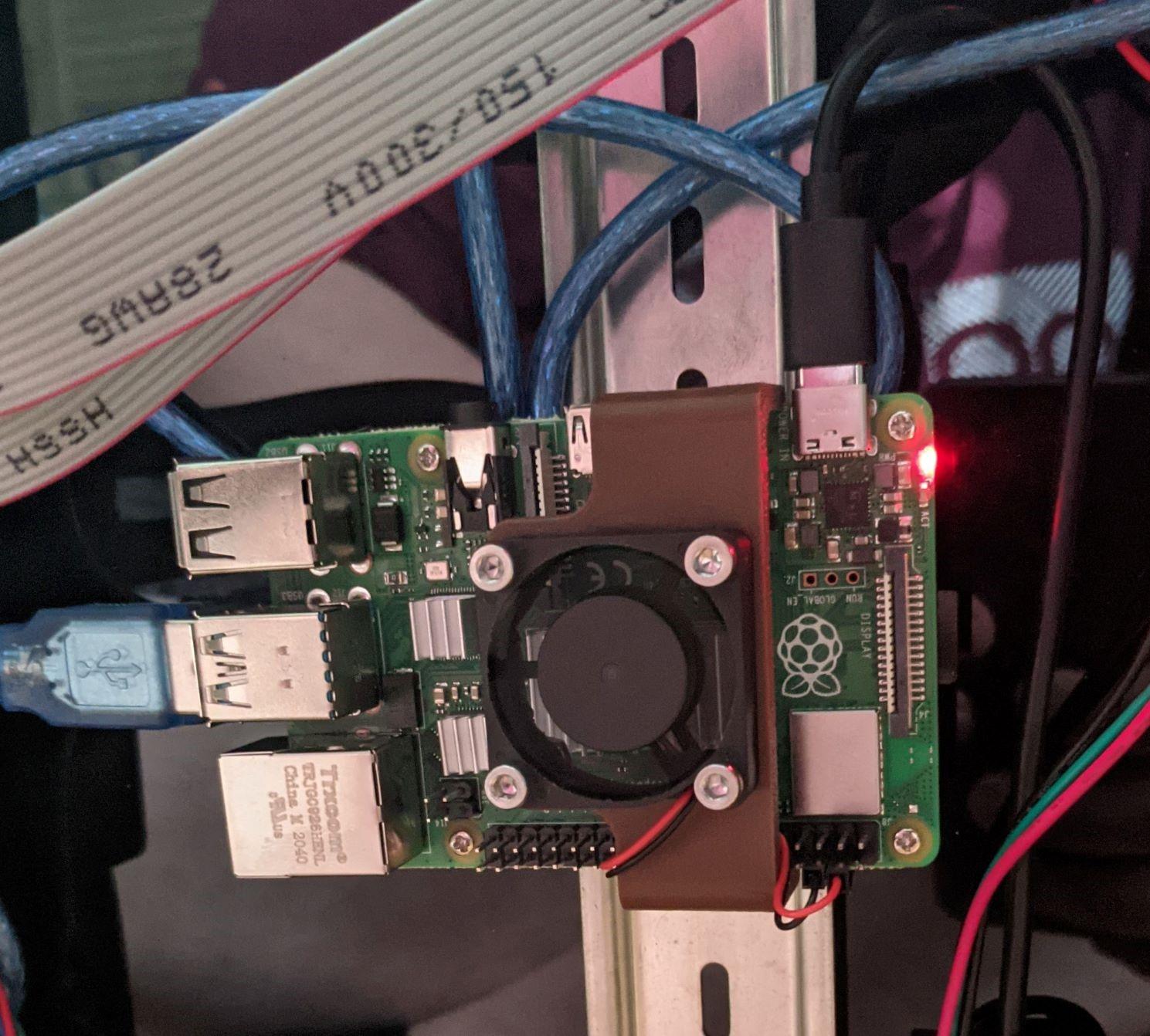 Raspberry Pi 4B Clip-on Fan Mount 30x30 - Heatsinks + fan mounted to RPI4B and working. - 3d model