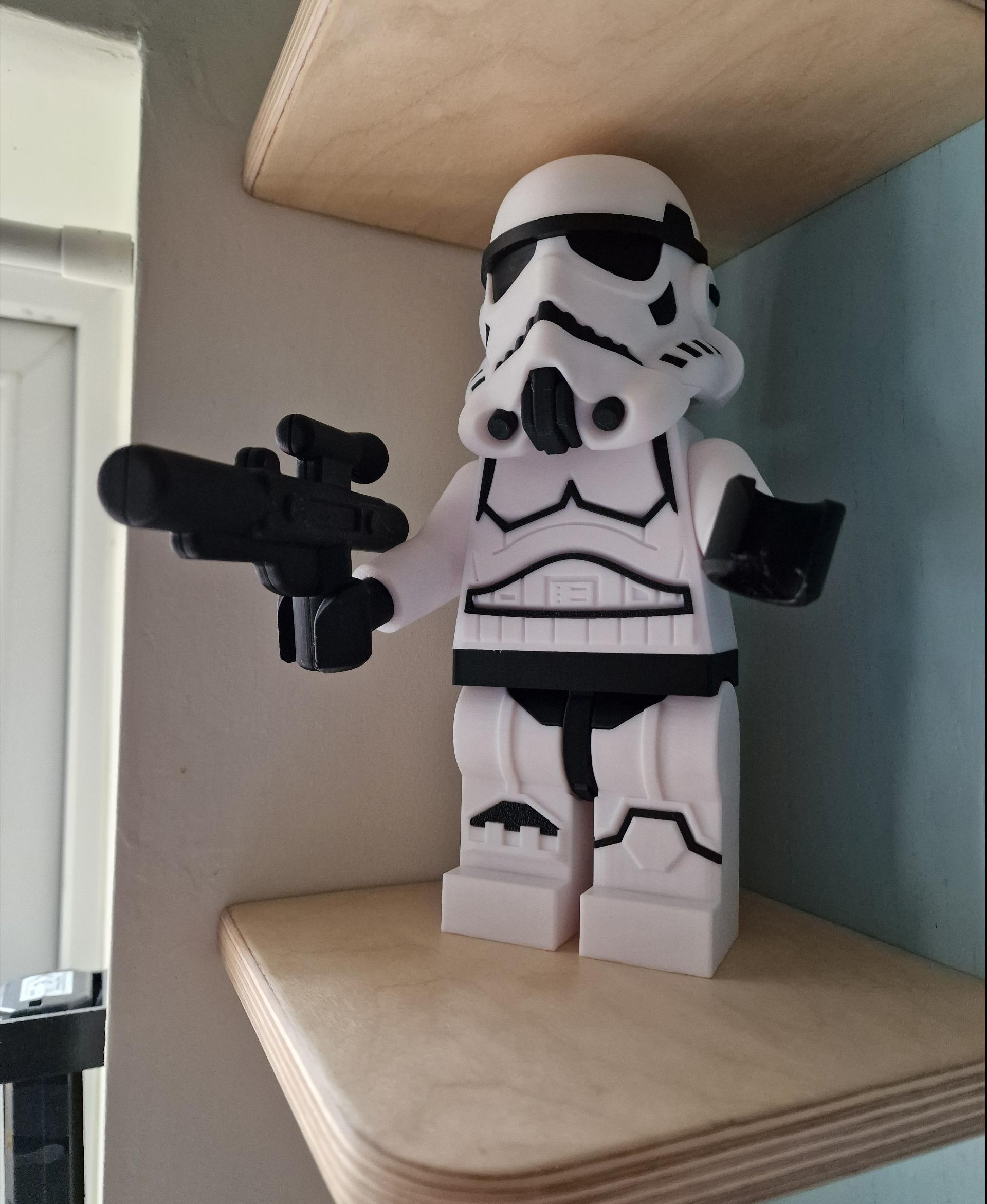 Stormtrooper (9 inch brick figure, NO MMU/AMS, NO supports, NO glue) - Printed with a 0.4 nozzle at 0.08 layer height for the nice contours and minimal stair stepping. A great model and demo of dimensional accuracy and great part design.

Done in Sunlu PLA+ black and white. - 3d model