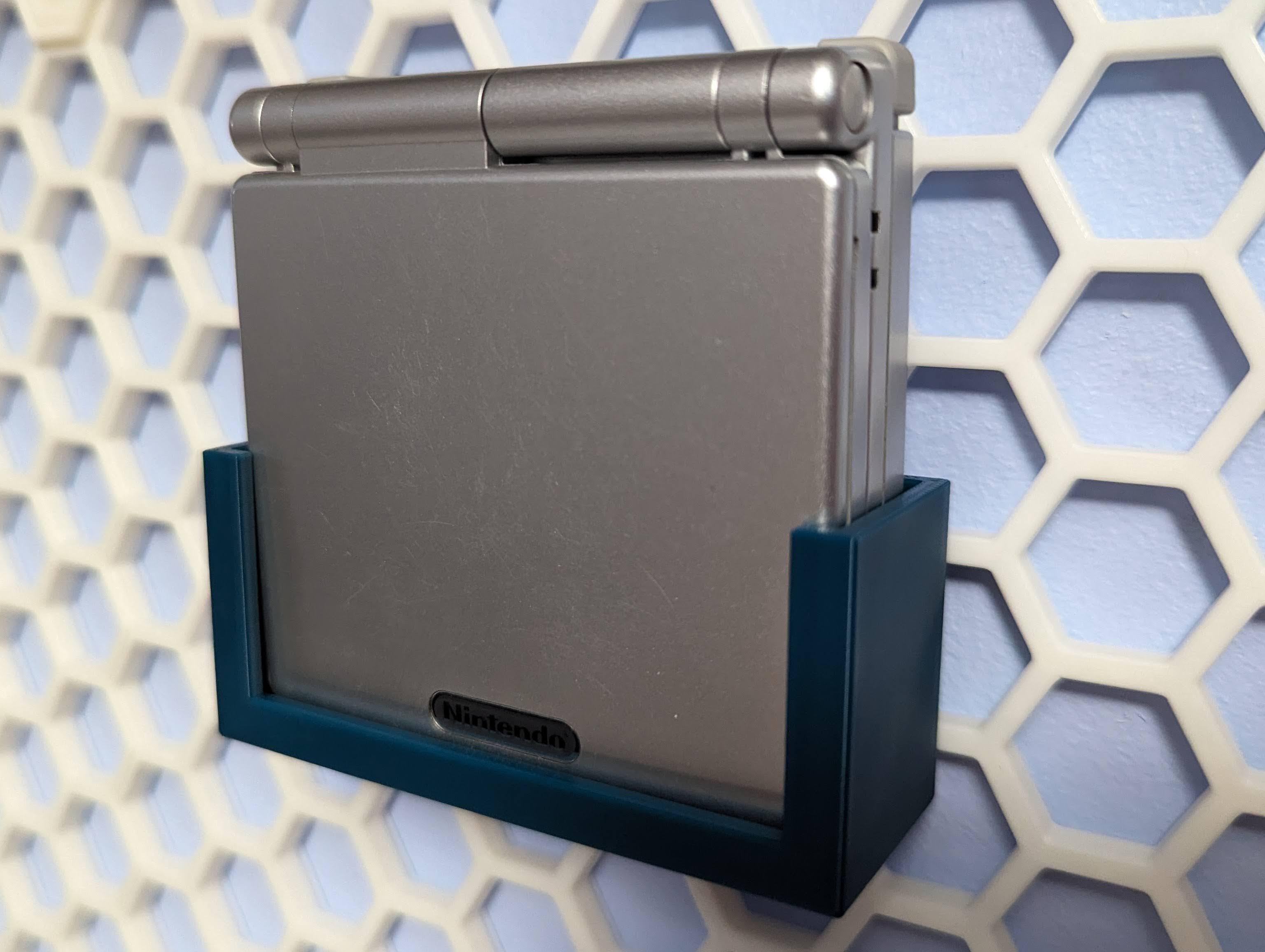 GameBoy Advance SP Holder Honeycomb Storage Wall 3d model