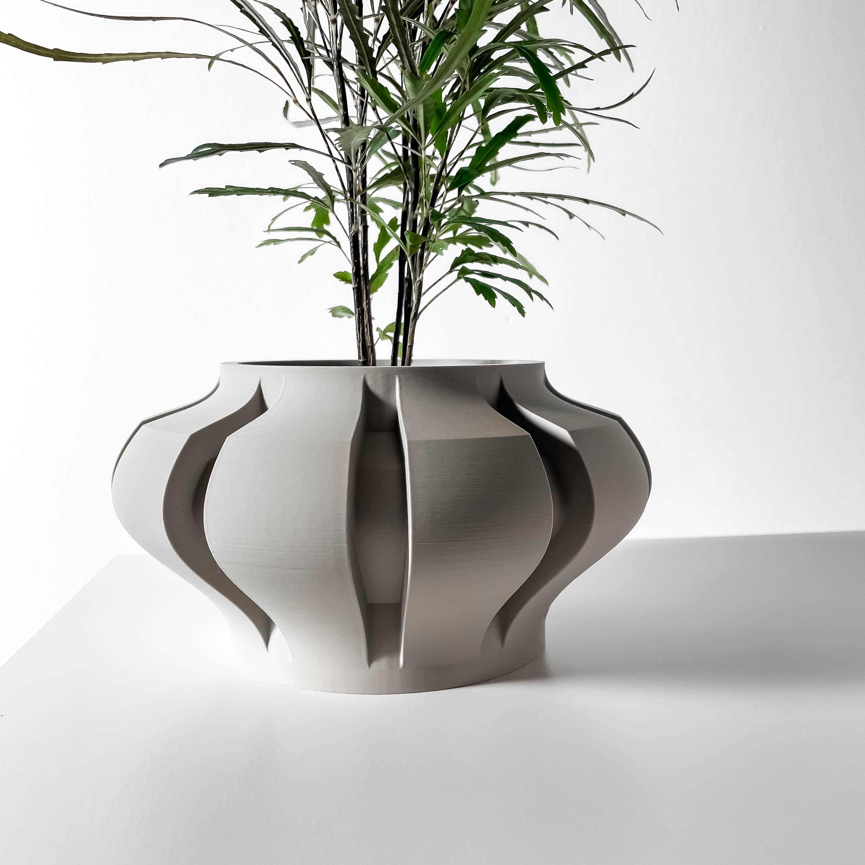 The Ariko Planter Pot with Drainage Tray & Stand Included: Modern and Unique Home Decor for Plants a 3d model