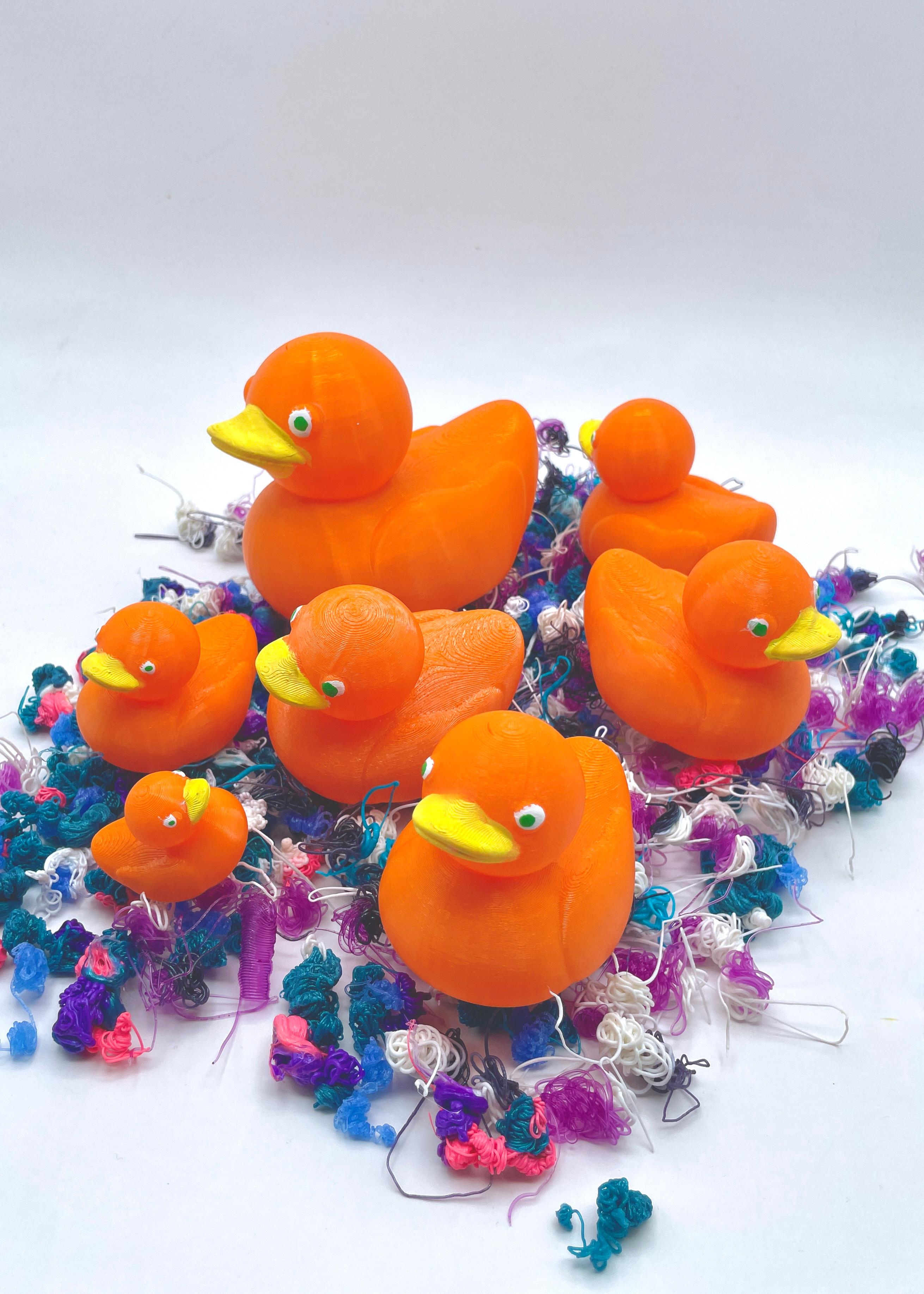 TPU Rubber Duck | Compatible with The Squeaker! by SpoolDesigns | 3D print your own squeaky toy! - Printed in Polymaker TPU 95 and hand-painted with acrylic paint! So fun! - 3d model