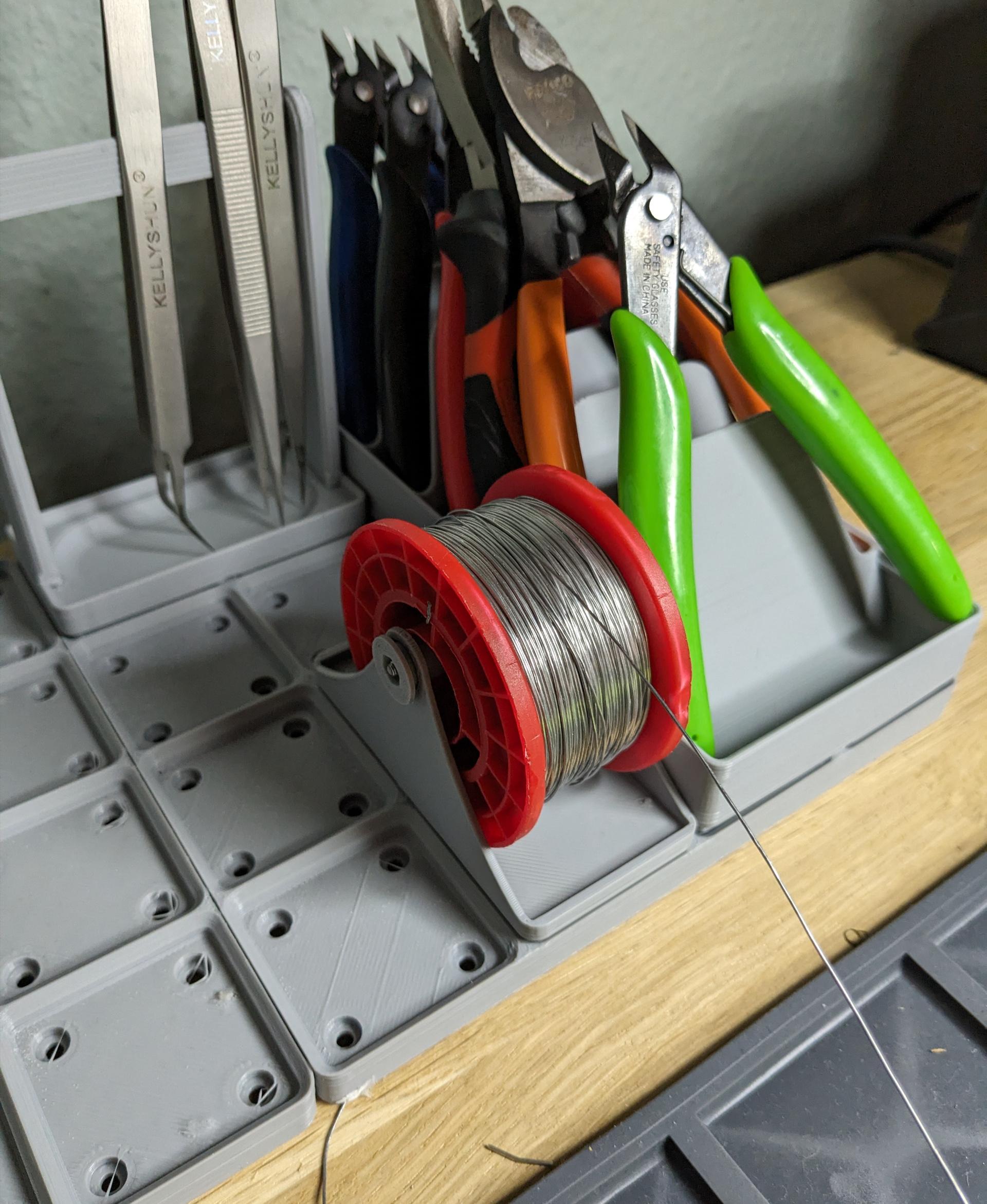 Gridfinity Solder Spool Holder - Works alright for a Loctite 309 60EN spool, but the 60mm diameter is not raised enough so it's dragging on the bottom. - 3d model
