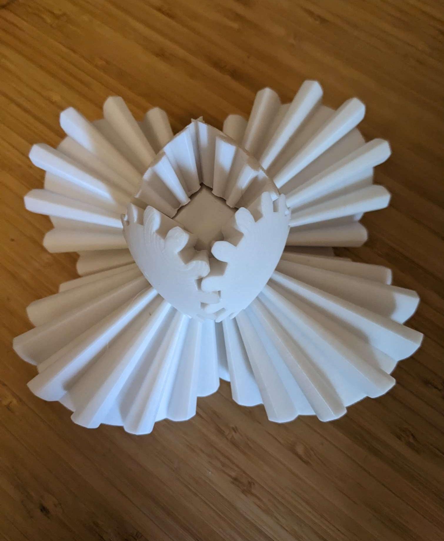 Gear Ball - made from white PLA. Found out the hard way that this material was way too prittle for the clamps, so I redid them in nylon (PA) - nice :) - 3d model