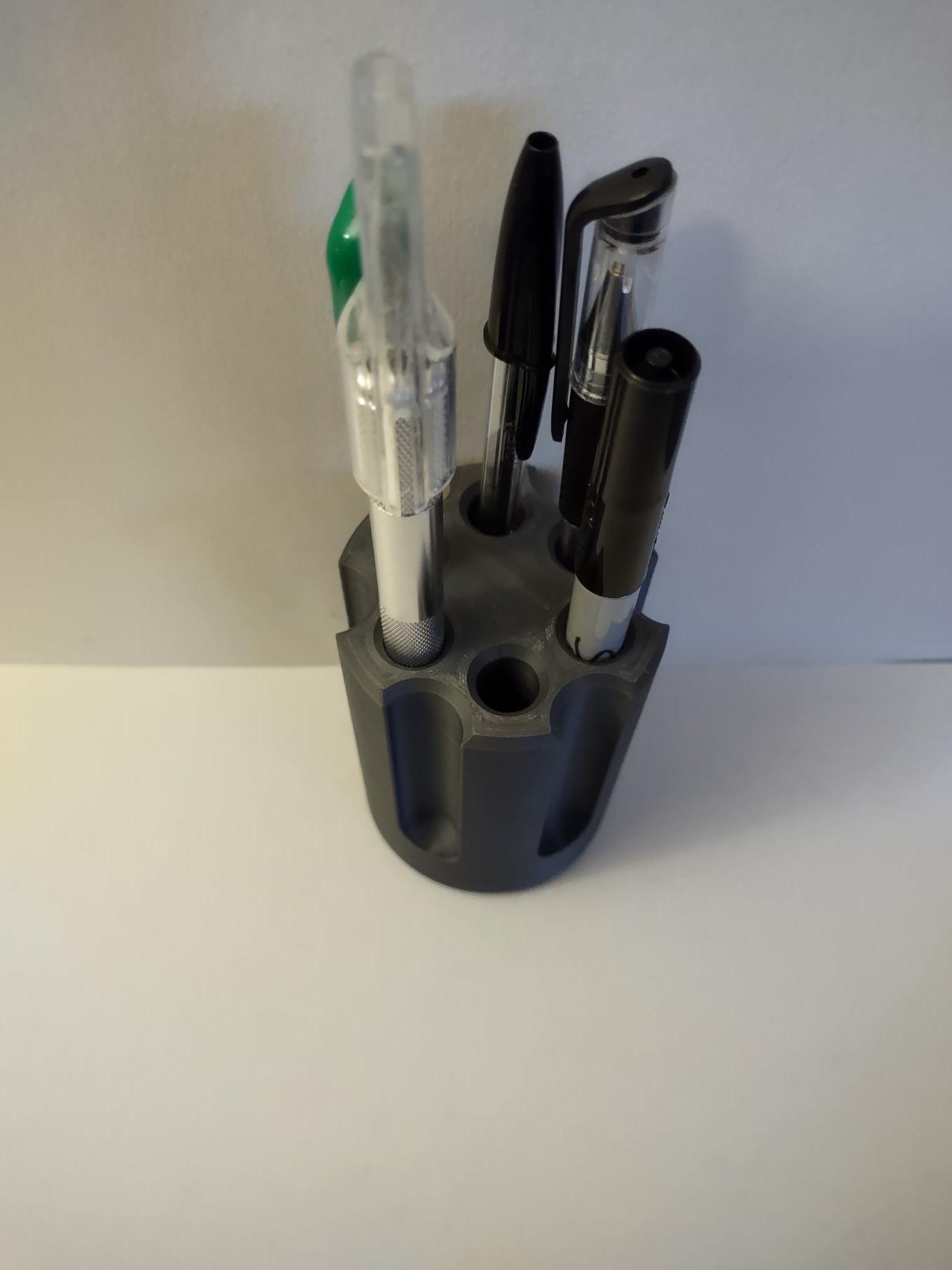 revolver cylinder pen holder with a twist   3d model