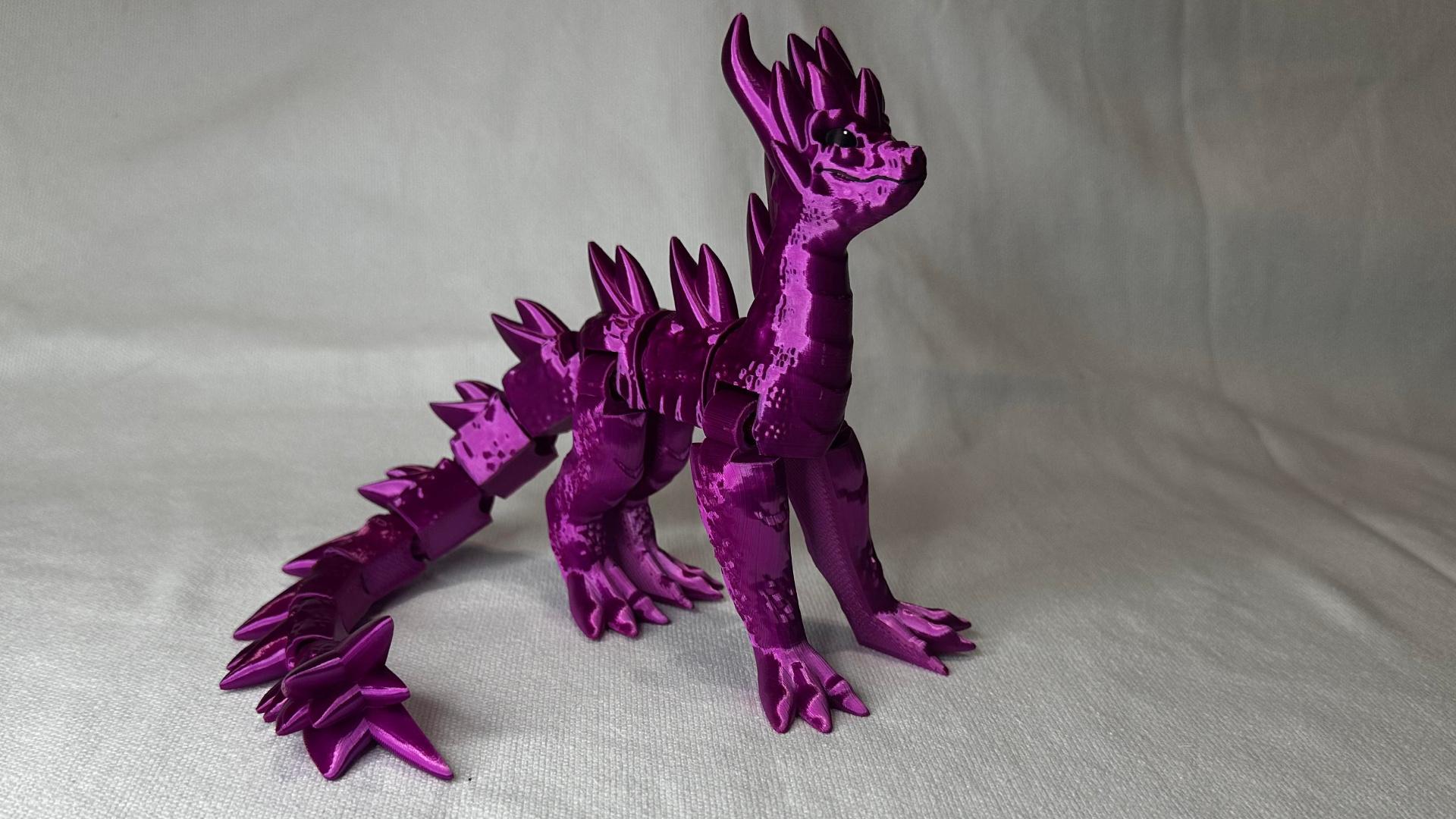 Spryo Youngling Dragon - Printed with Polymaker Silk Magenta. Hand painted the eyes, nose and mouth. - 3d model