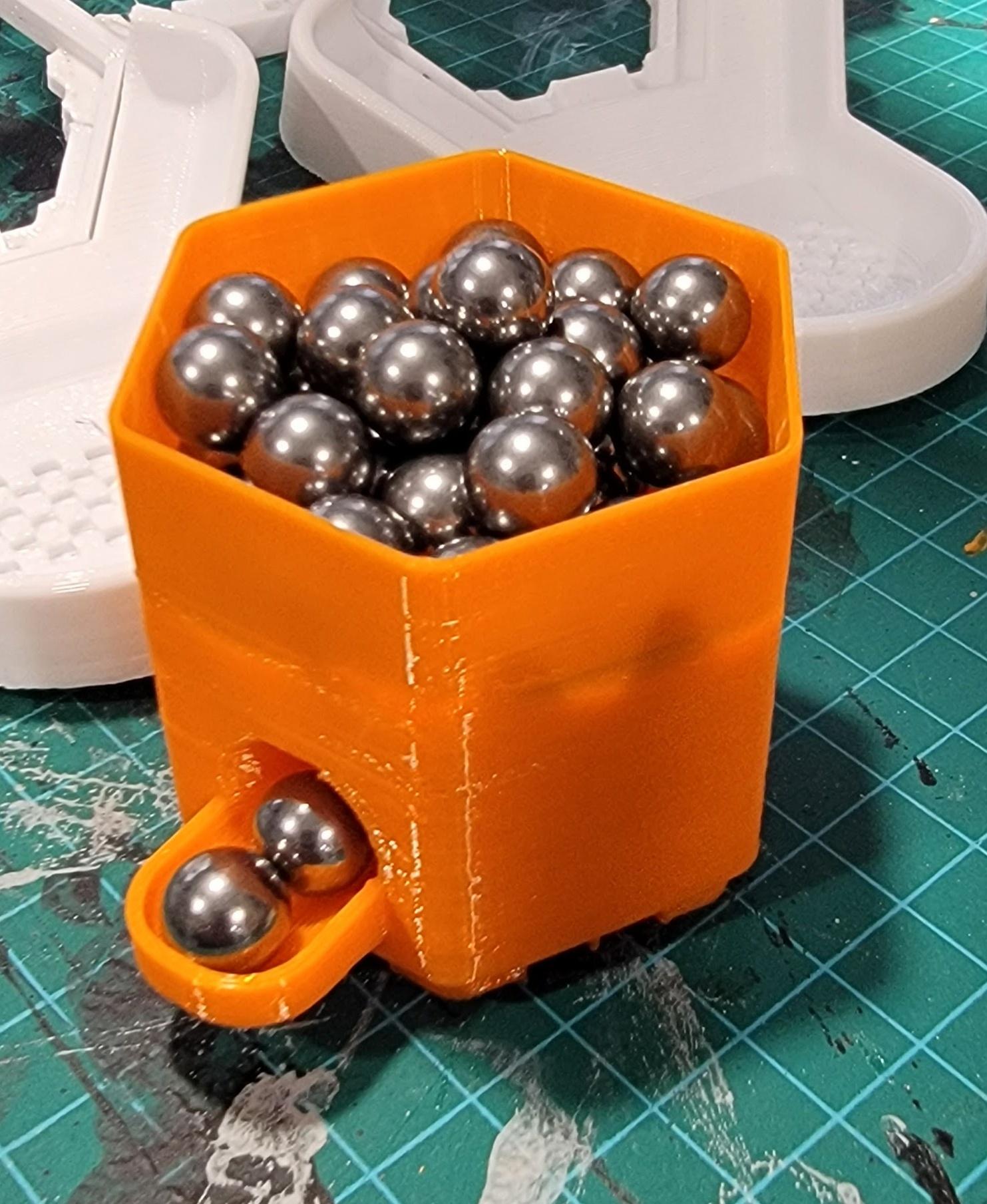 Hextraction Tile Ball Holder - Give it a shake once a while to get the flow going, but works great otherwise. Nice easy print! - 3d model