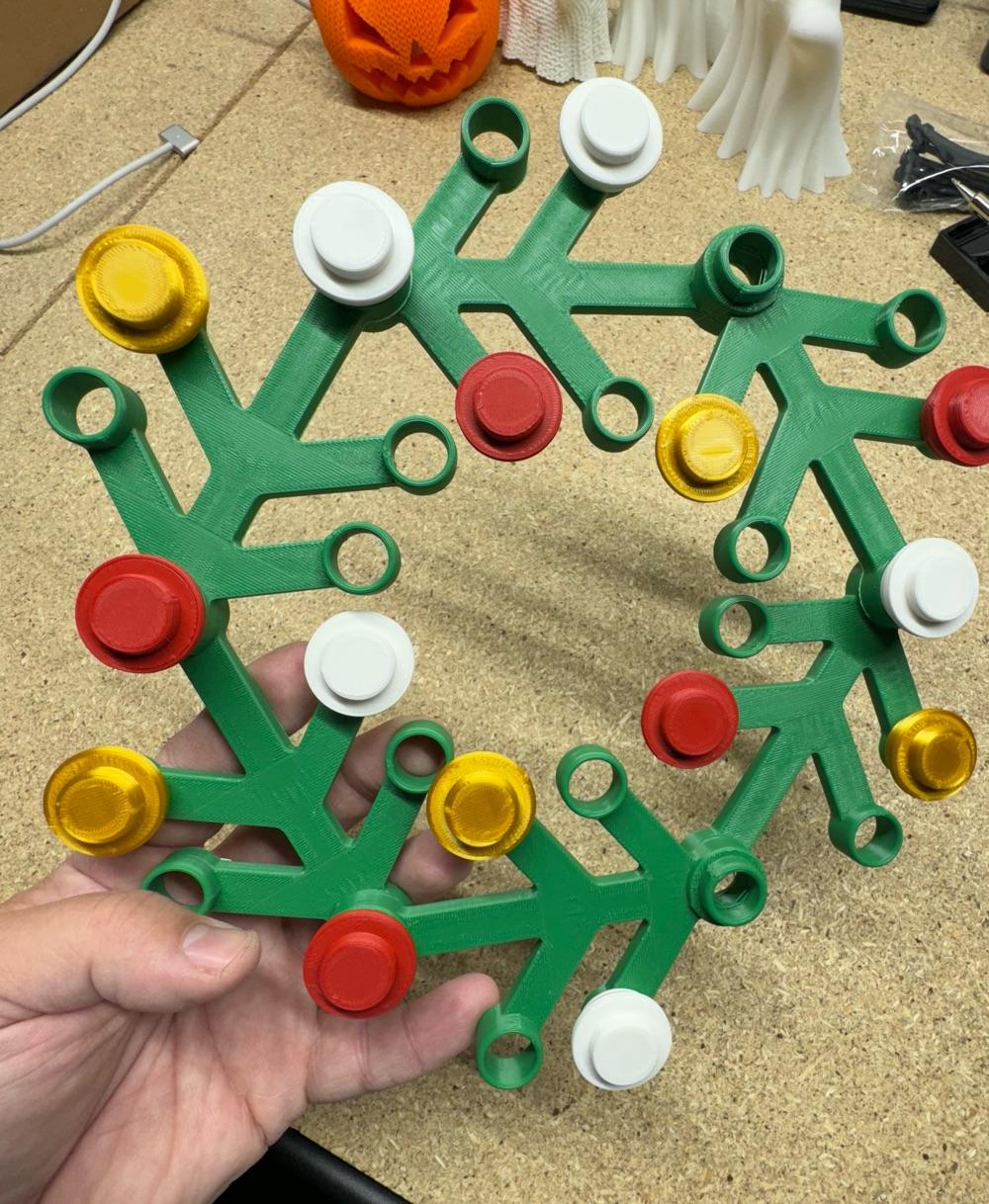 LEt'GO Holiday Wreath  - Easy to print design that came out great! Leafs printed with Polymaker green ASA on the Bambu Lab P1S and the studs printed with Polymaker PLA/Silk PLA on the Elegoo Neptune 3 Pro.  - 3d model