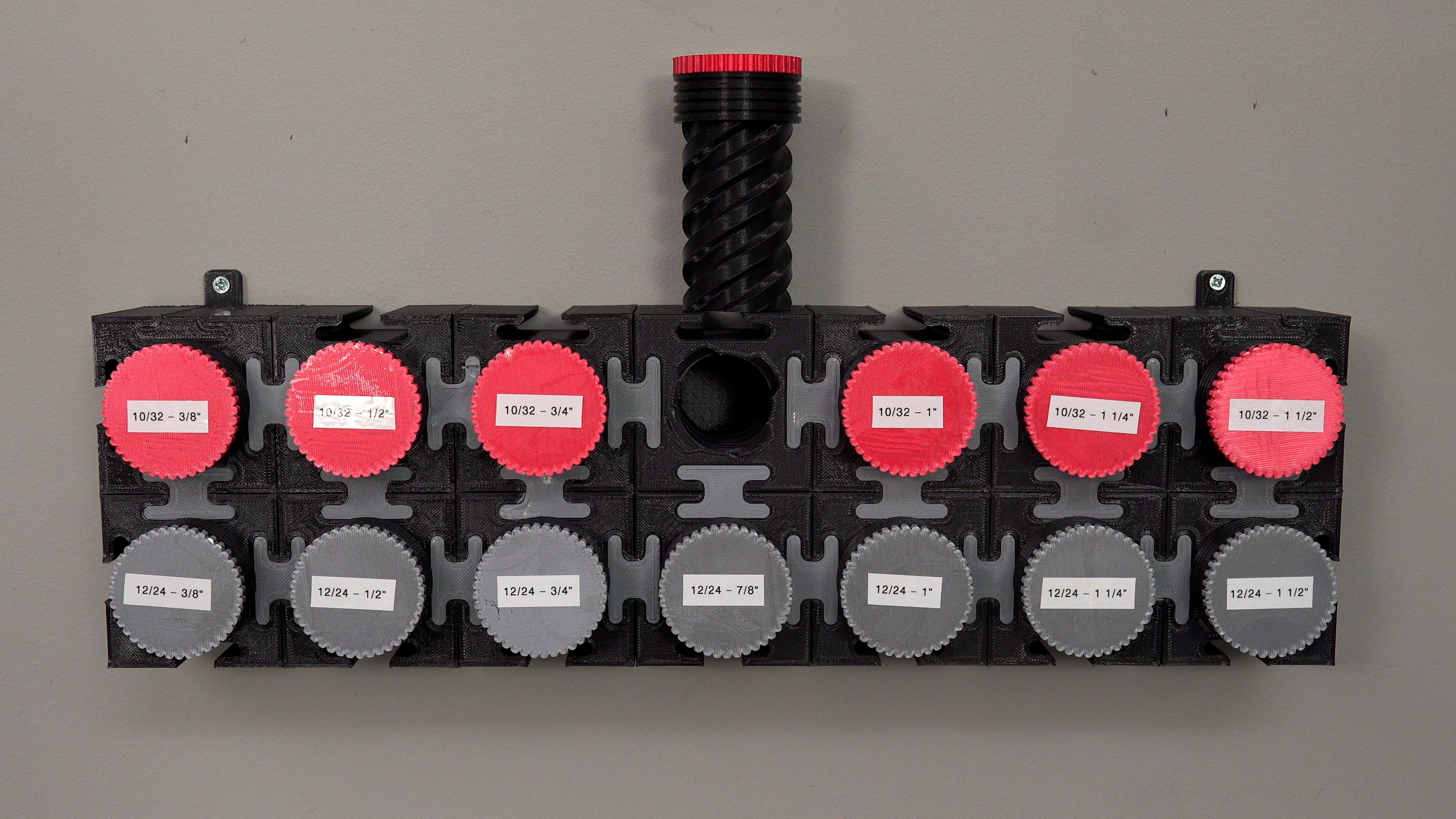 Modular Bolt Organizer  - This is a 2x7 matrix of the bolt organizer, which is mounted to my wall. The color of the cap symbolizes the pitch and diameter of the bolt, while the white label designates the length.  - 3d model