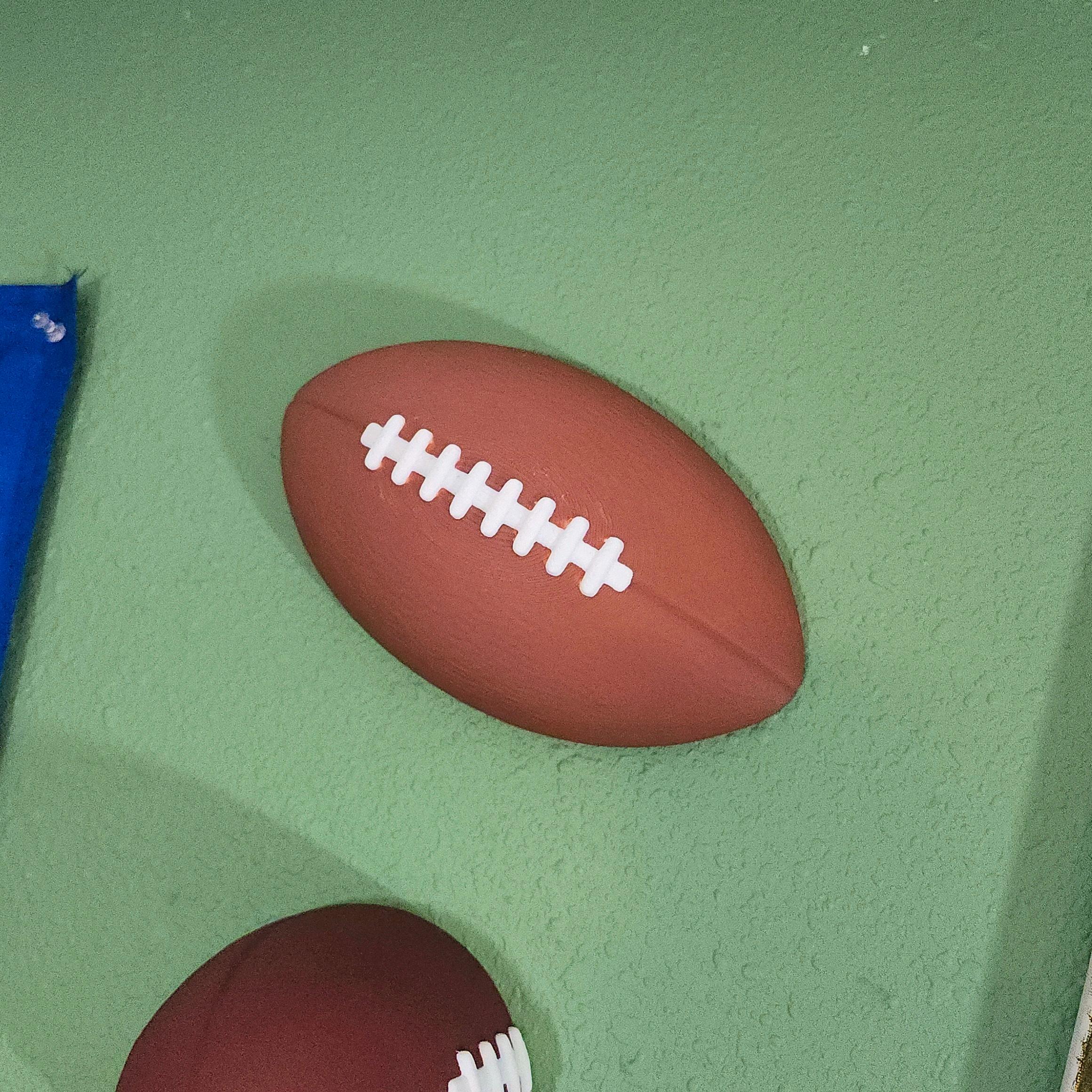 Pair of Lifesize Decorative Football Halves :: 'Wall Ballz' Hanging Pop-Out 3D Art Collection 3d model