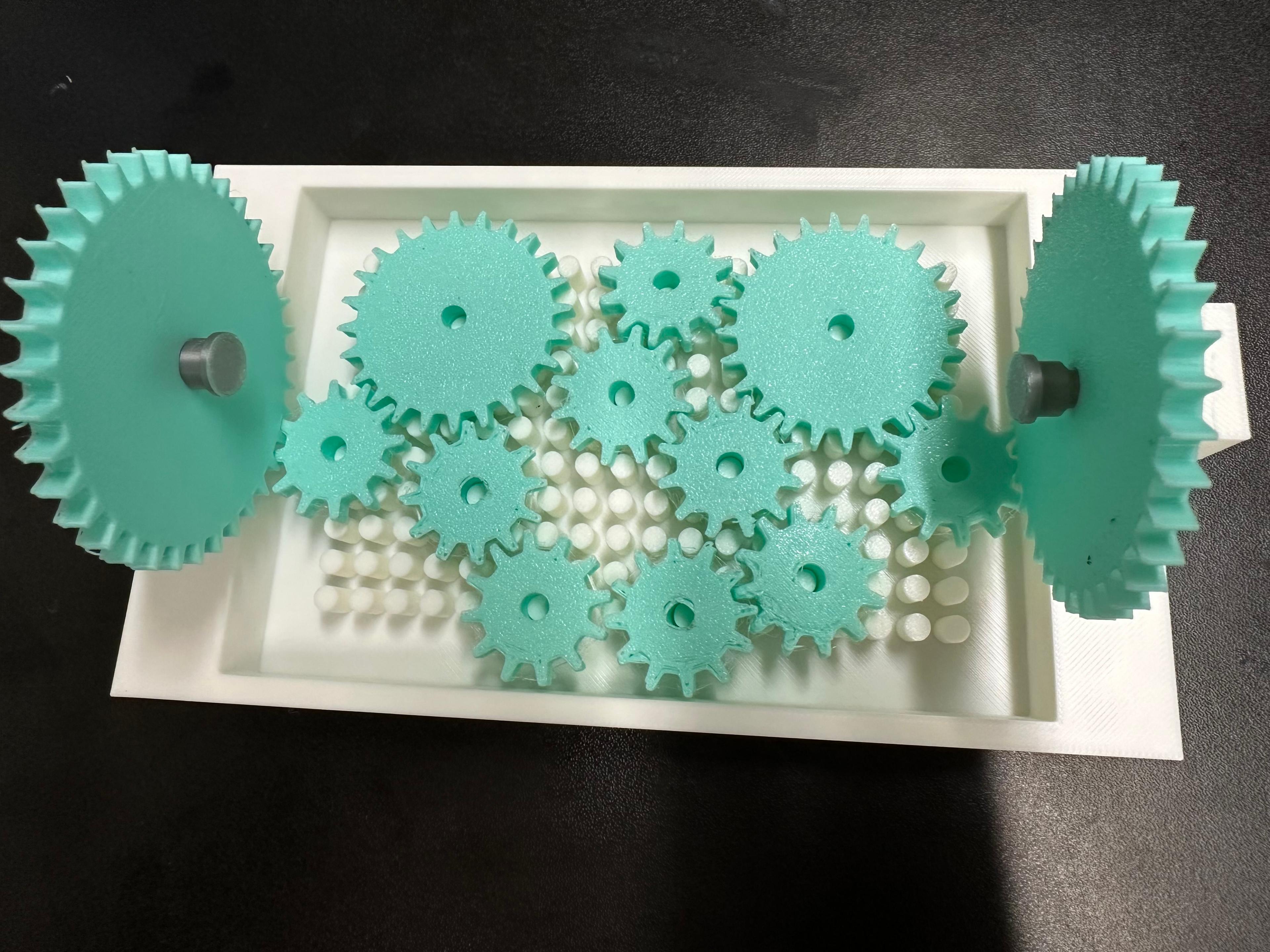 Gear Pathing Maze - concept level - a couple of the gears failed during printing due to bed adherece. Reprinted and they seem okay for now. Was able to fit all 11 pieces on, but can't get them to turn. Plan to make a few more of these to use with my elementary STEM students. - 3d model