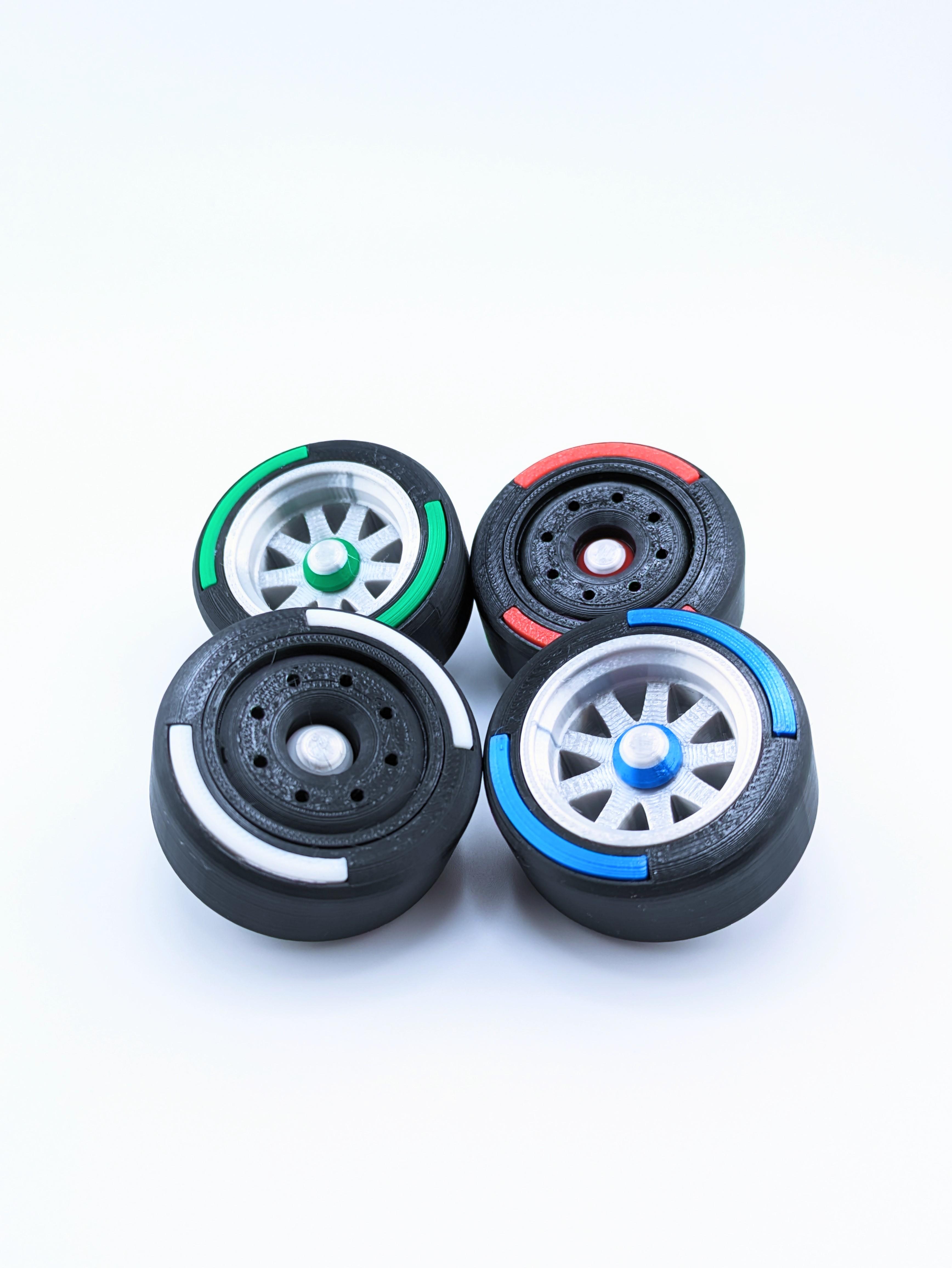 Spinning F1 Inspired Tire Keychain 3d model