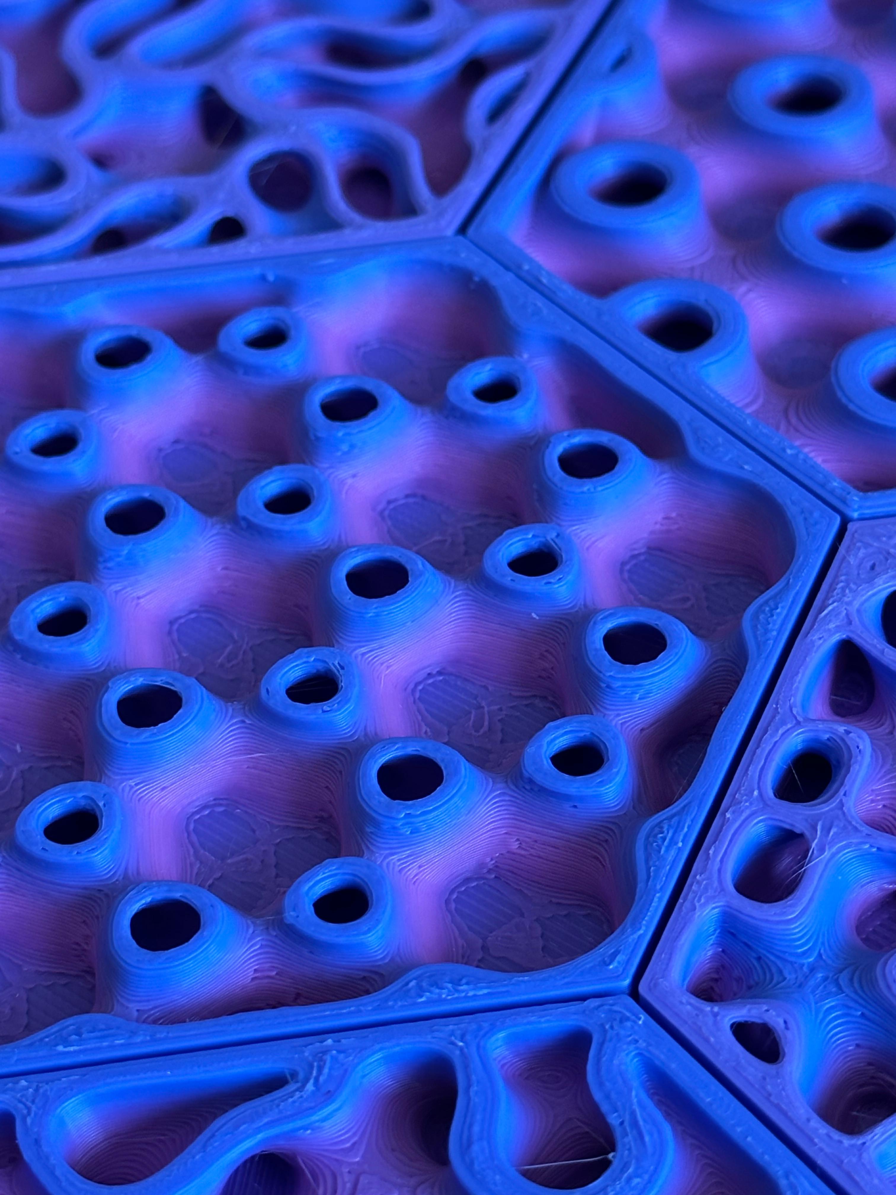 MEAN* wraps hermès pop-up in vivid 3D-printed tessellation