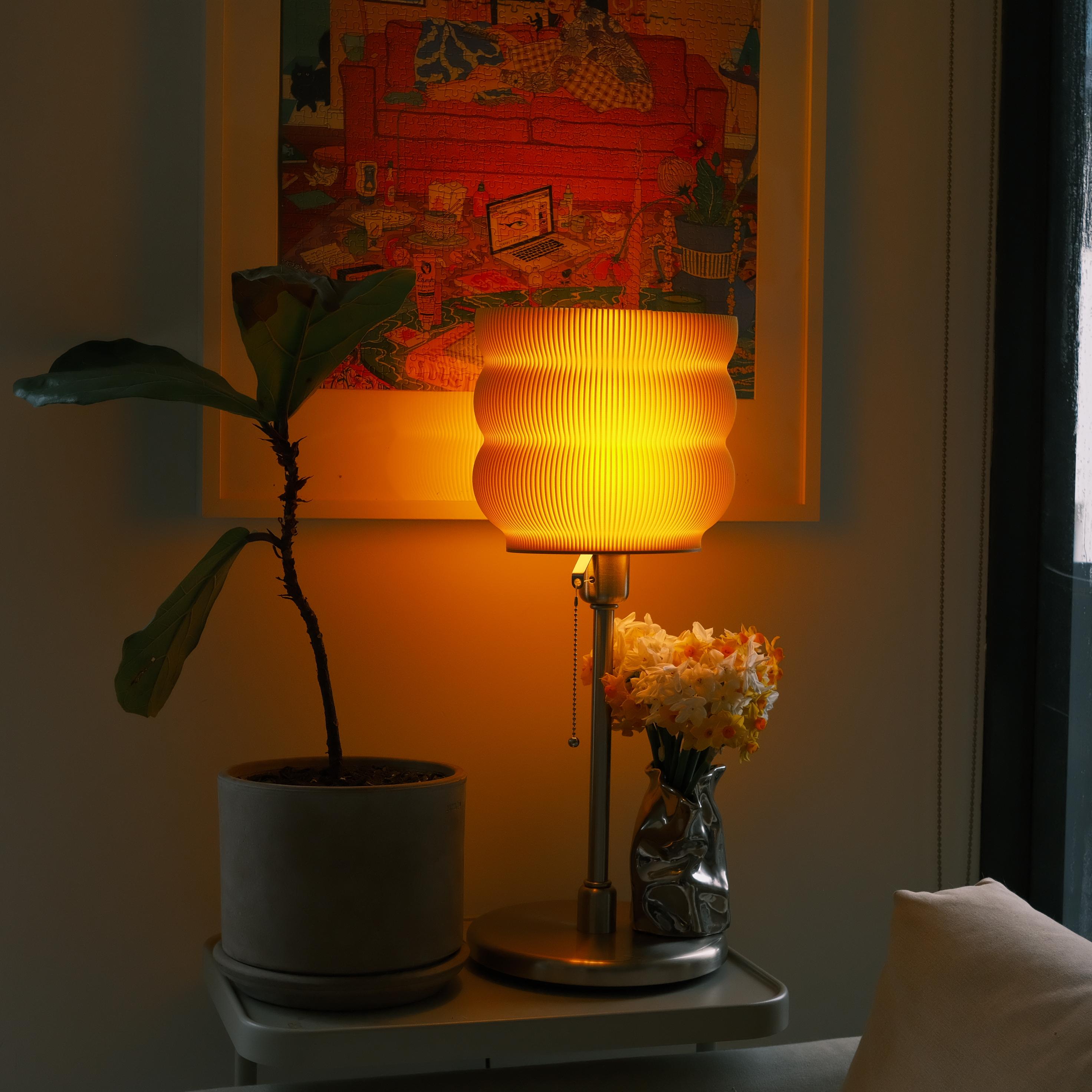 Orbitier Jumbo lamp printed in PolyTerra Pastel Banana. Standing at 60cm tall.