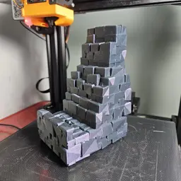 Printed at full scale, and at .16mm layer height the tops of the bricks aren't smooth, but their slight angles make the textures interesting. Printed at 20% grid infill to give the model some weight, but weight could easily be glued inside the hollow core.
I wanted something a bit "chunkier" for my phone, and printed in Inland's blue-black shimmer PLA gives this a nice Masters of the Universe vibe. 3d model
