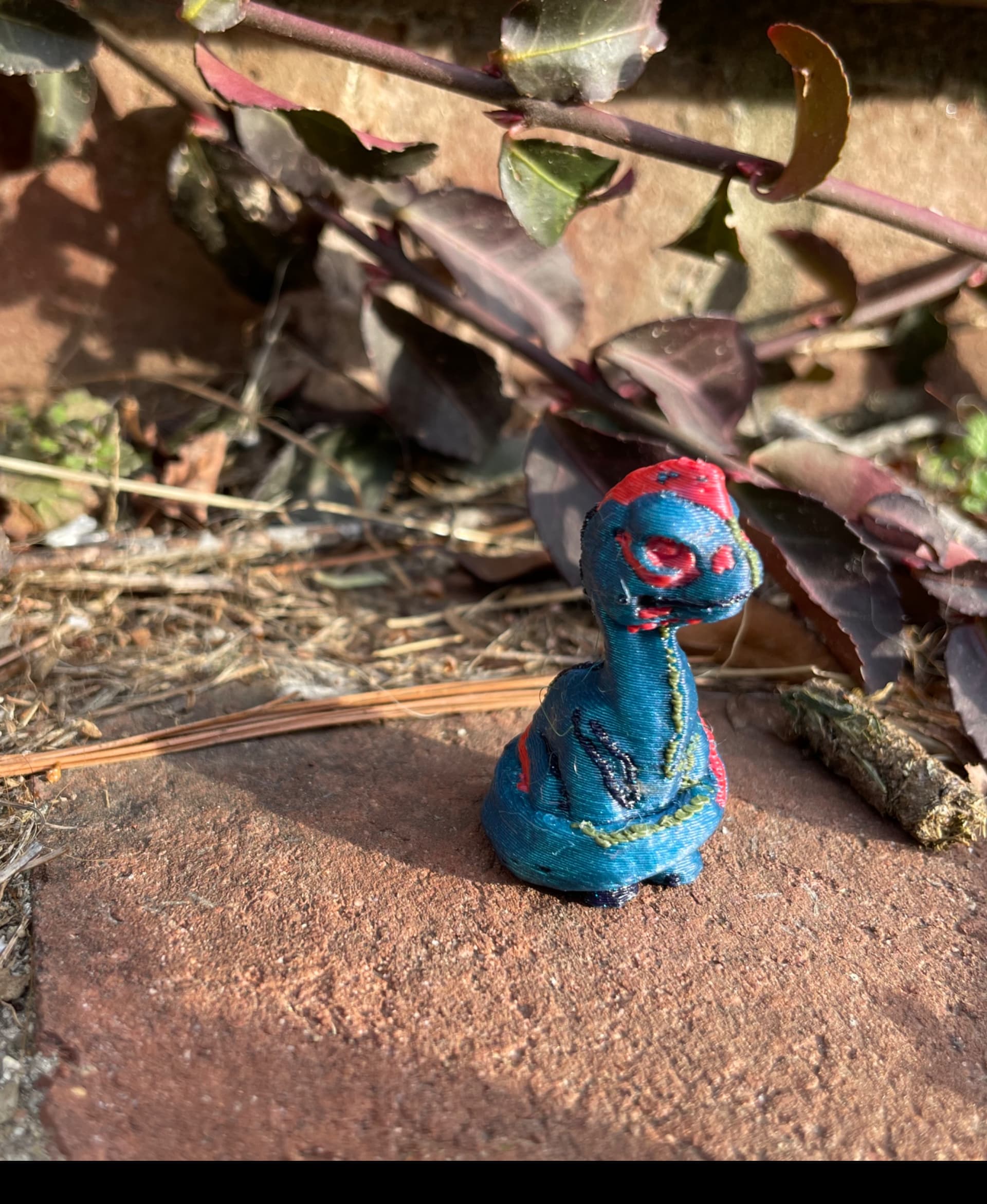 Baby Dino in multi-color.