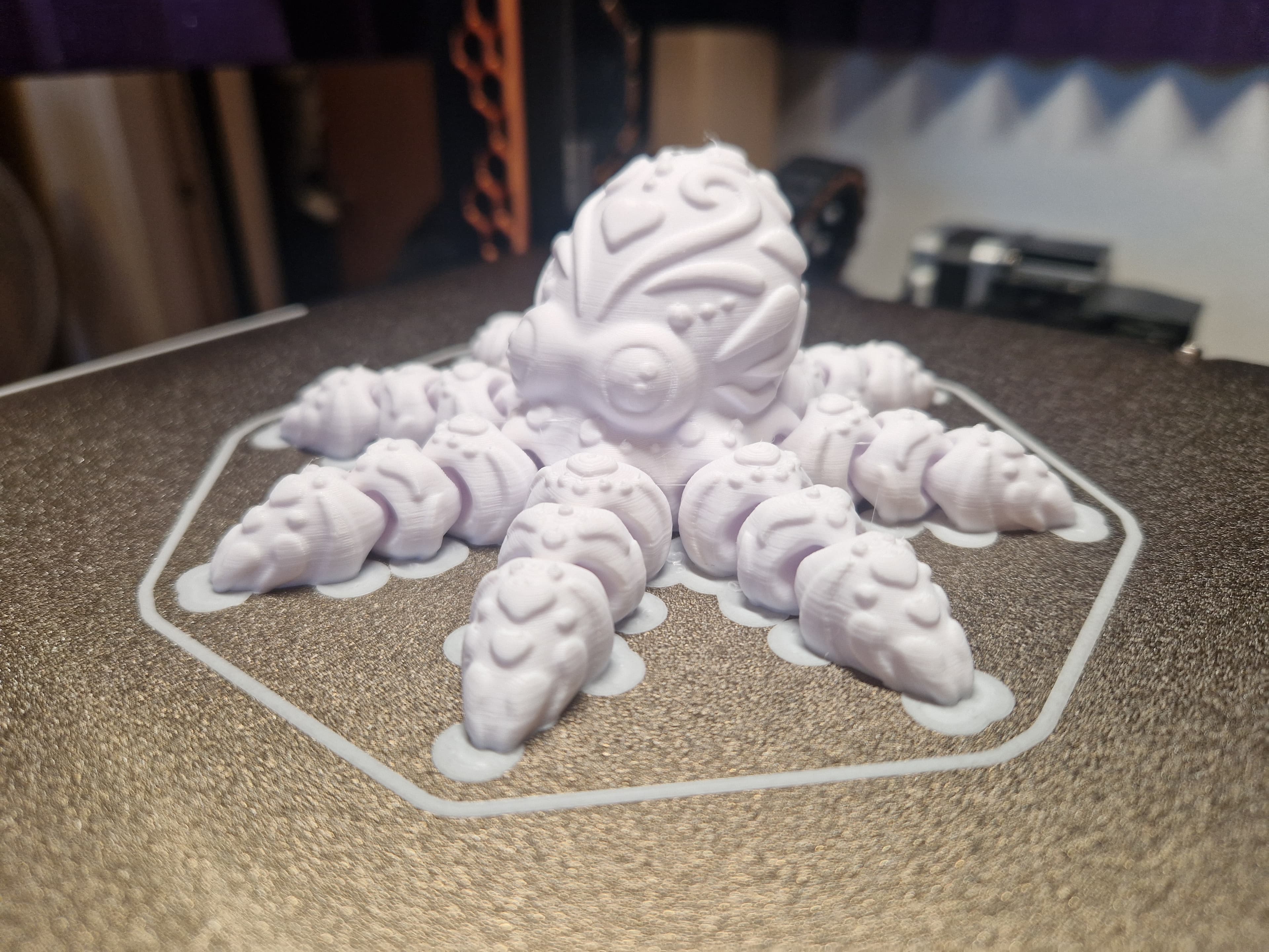 Coolest Octopus I have printed so far!! Printed really nice, I added some mouse ears which were a pain to remove. Next up is painting!