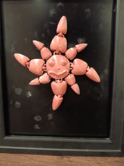 Smiling Sun magnet and flexi fidget toy 3d model