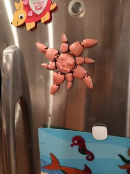Smiling Sun magnet and flexi fidget toy 3d model