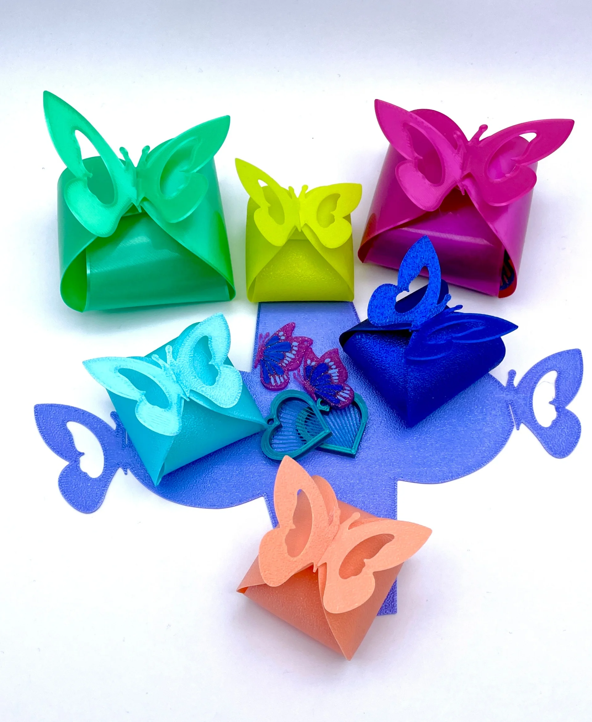 So many beautiful options! Polymaker Silk Green, Lime Green PLA, Silk Magenta, Silk Light Blue, Silk Dark Blue, Silk PEZriwinkle, and Spring Gradient