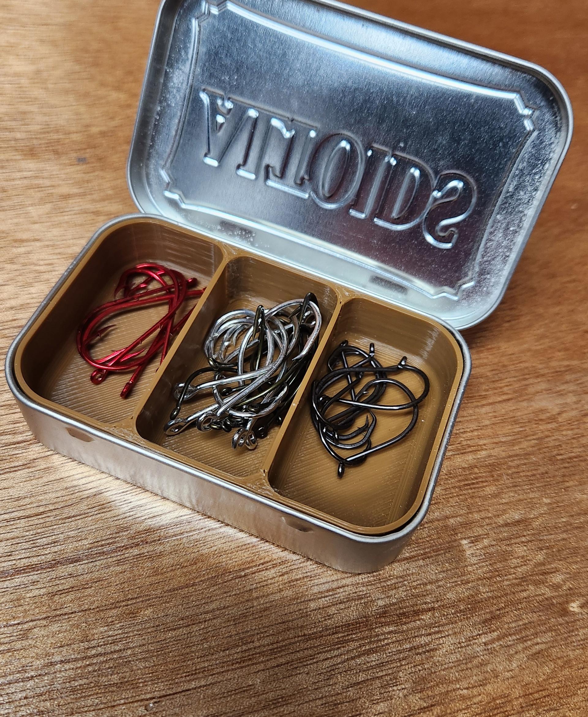 Fish hooks in an Altoids tin - Done up in Bone Brown PLA from Coex, LLC. Light colors are nice for visibility, I find. - 3d model