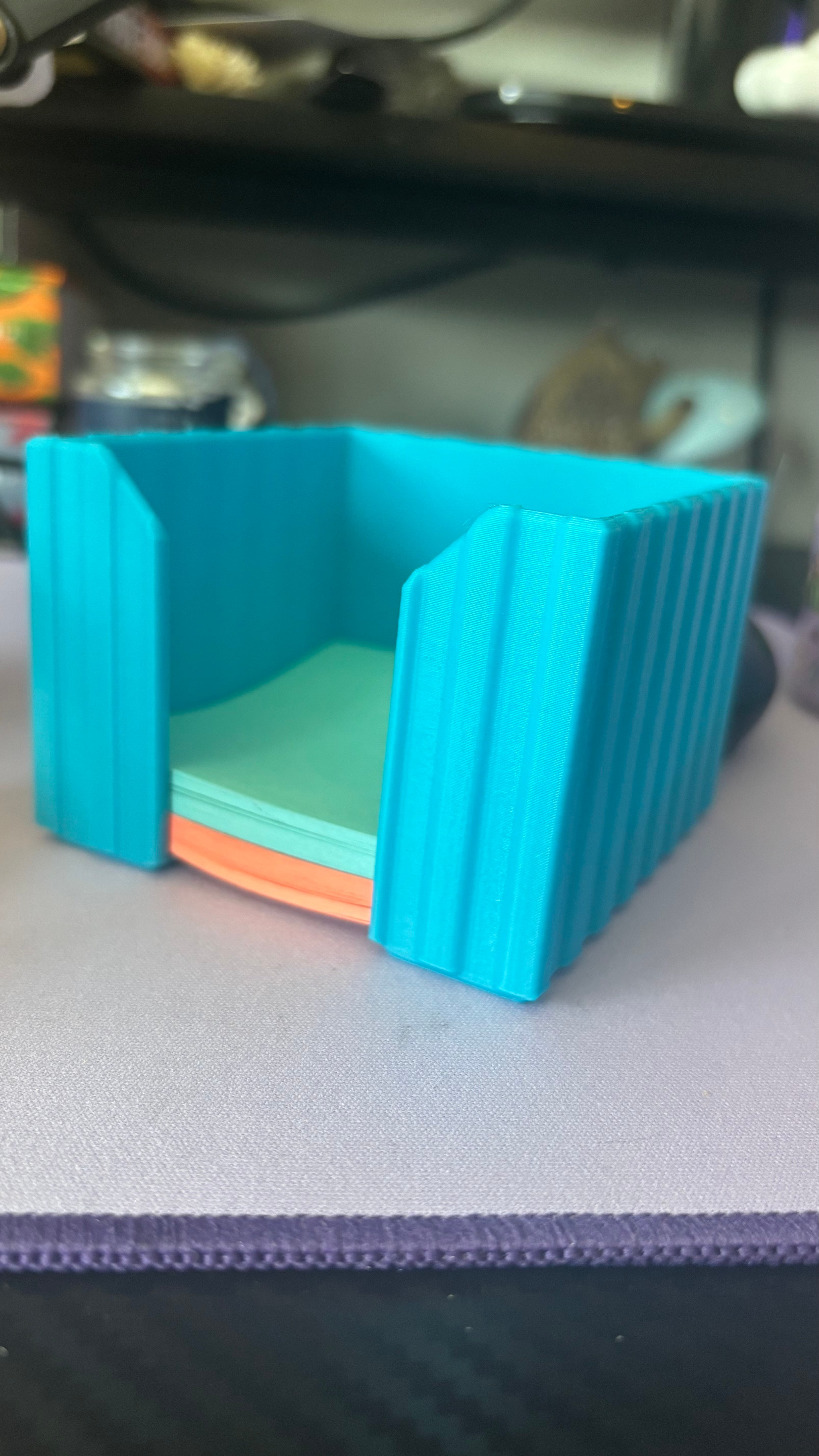 Loved this! The post-its are a bit of a tight fit so you have to push them down, but they pull out easy and its visually very nice :)
